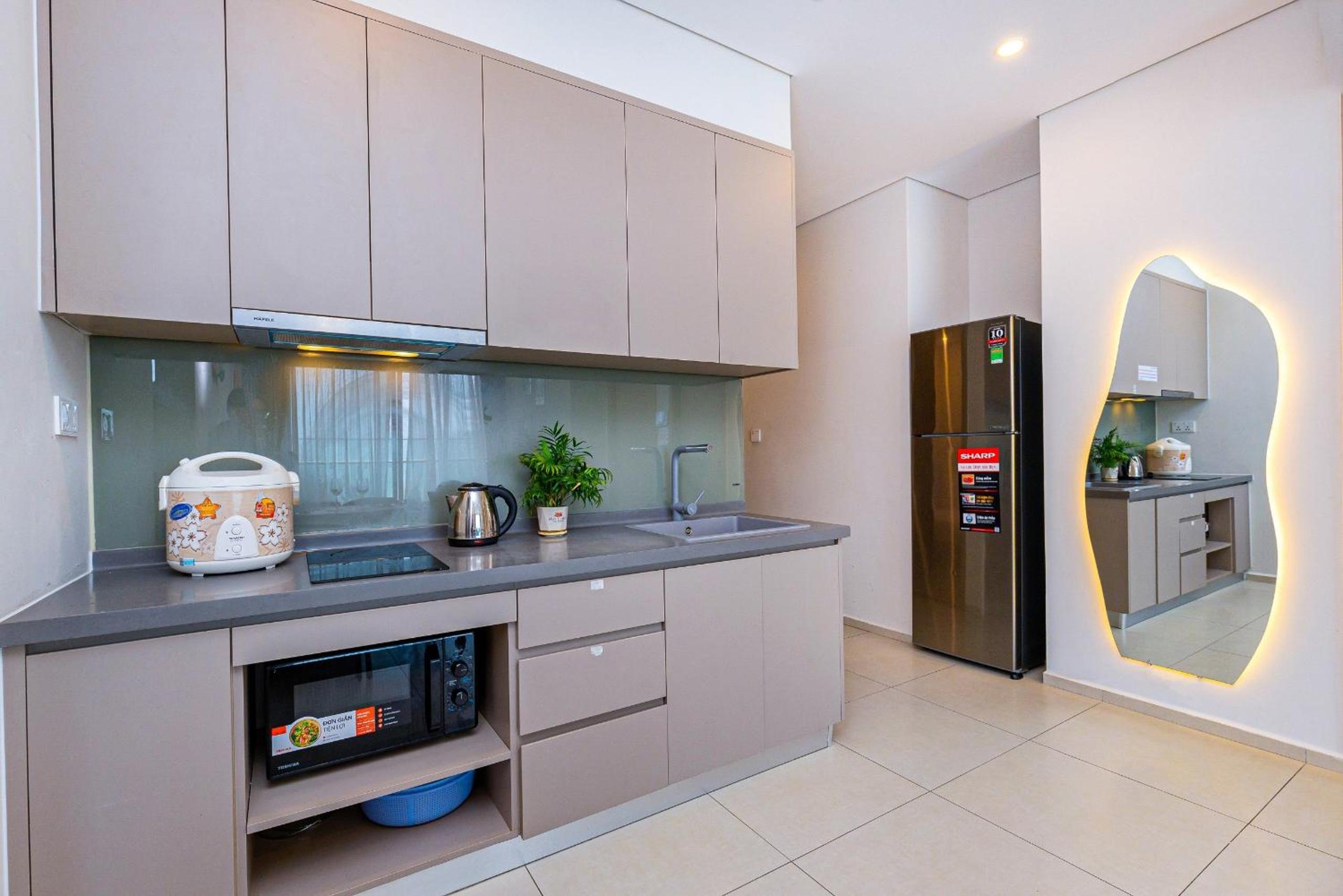 Three-Bedroom Apartment with Sea View - Photo 47