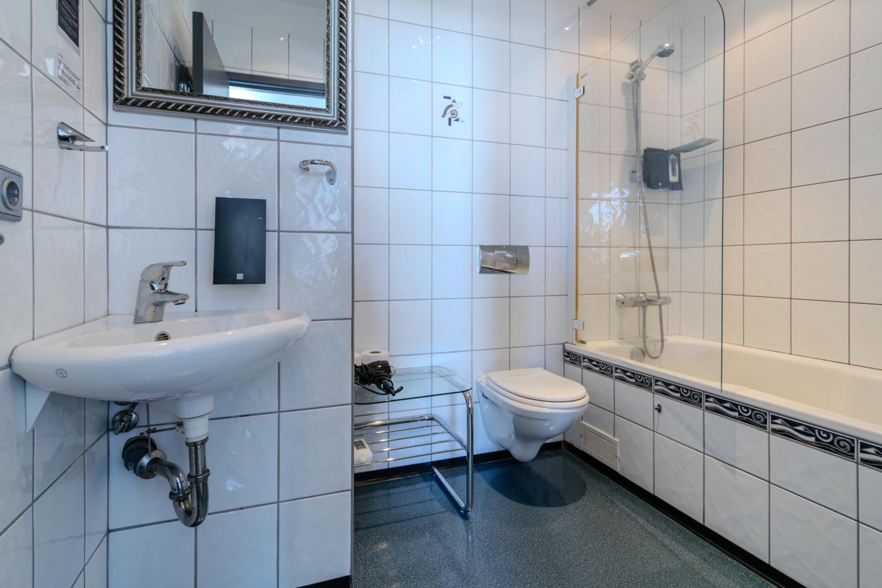 Three-Bedroom Apartment - Photo 5