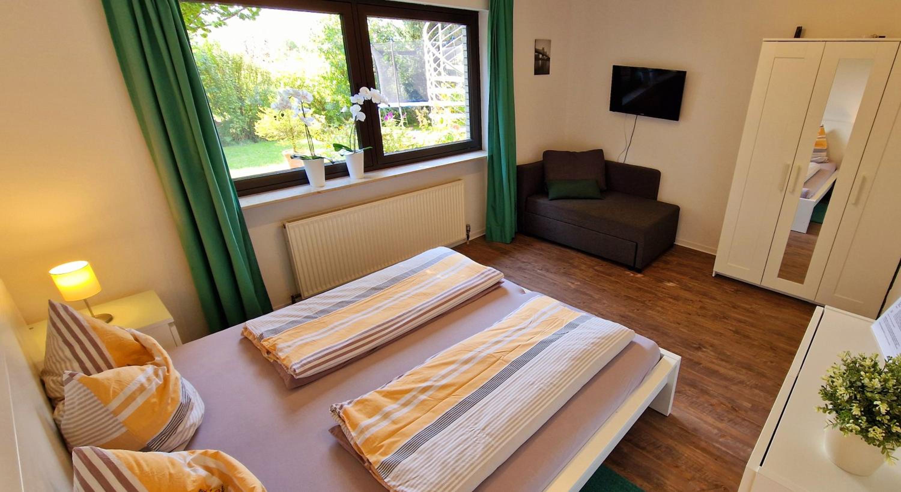 Three-Bedroom Apartment - Photo 10