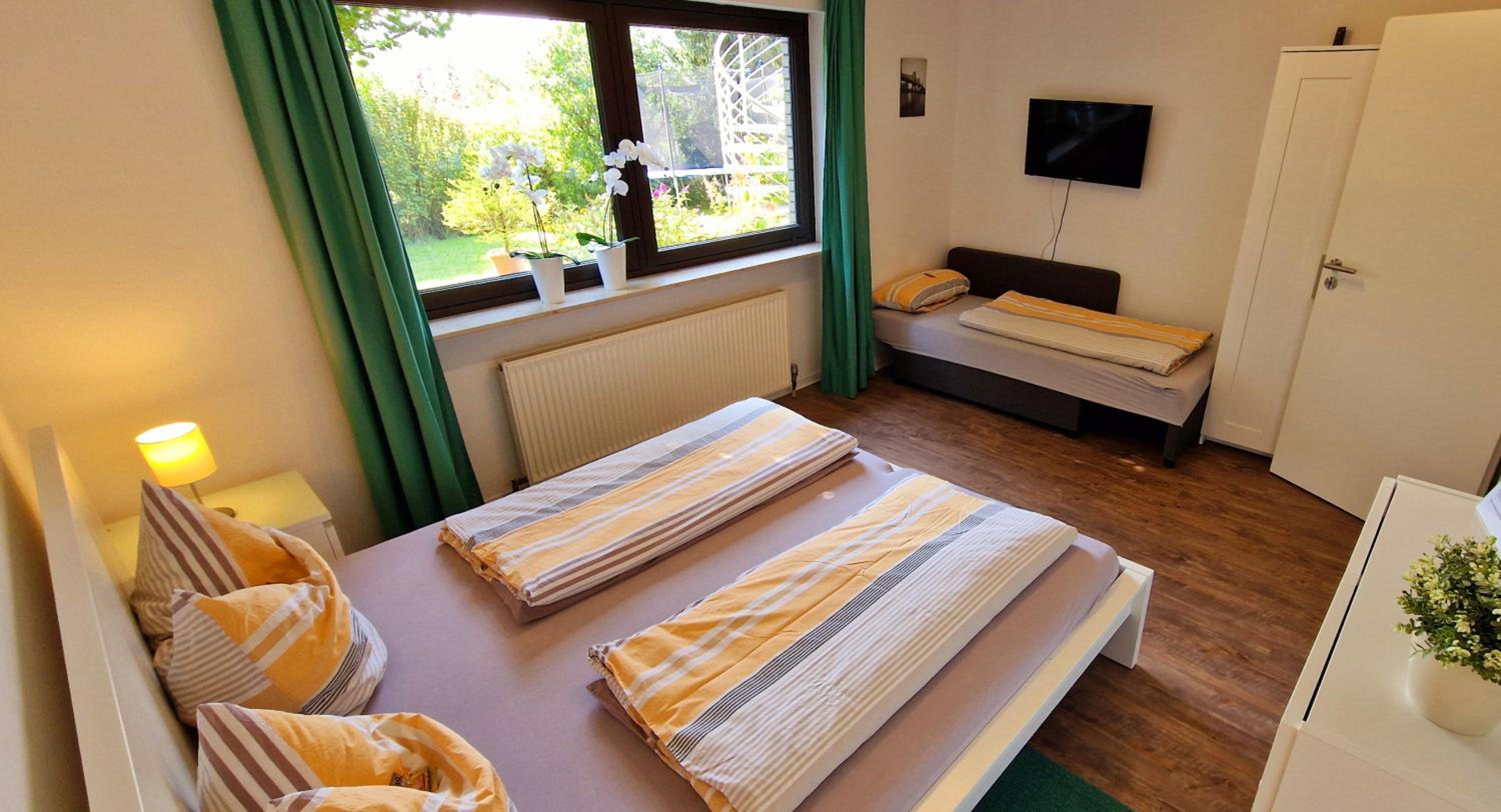 Three-Bedroom Apartment - Photo 9
