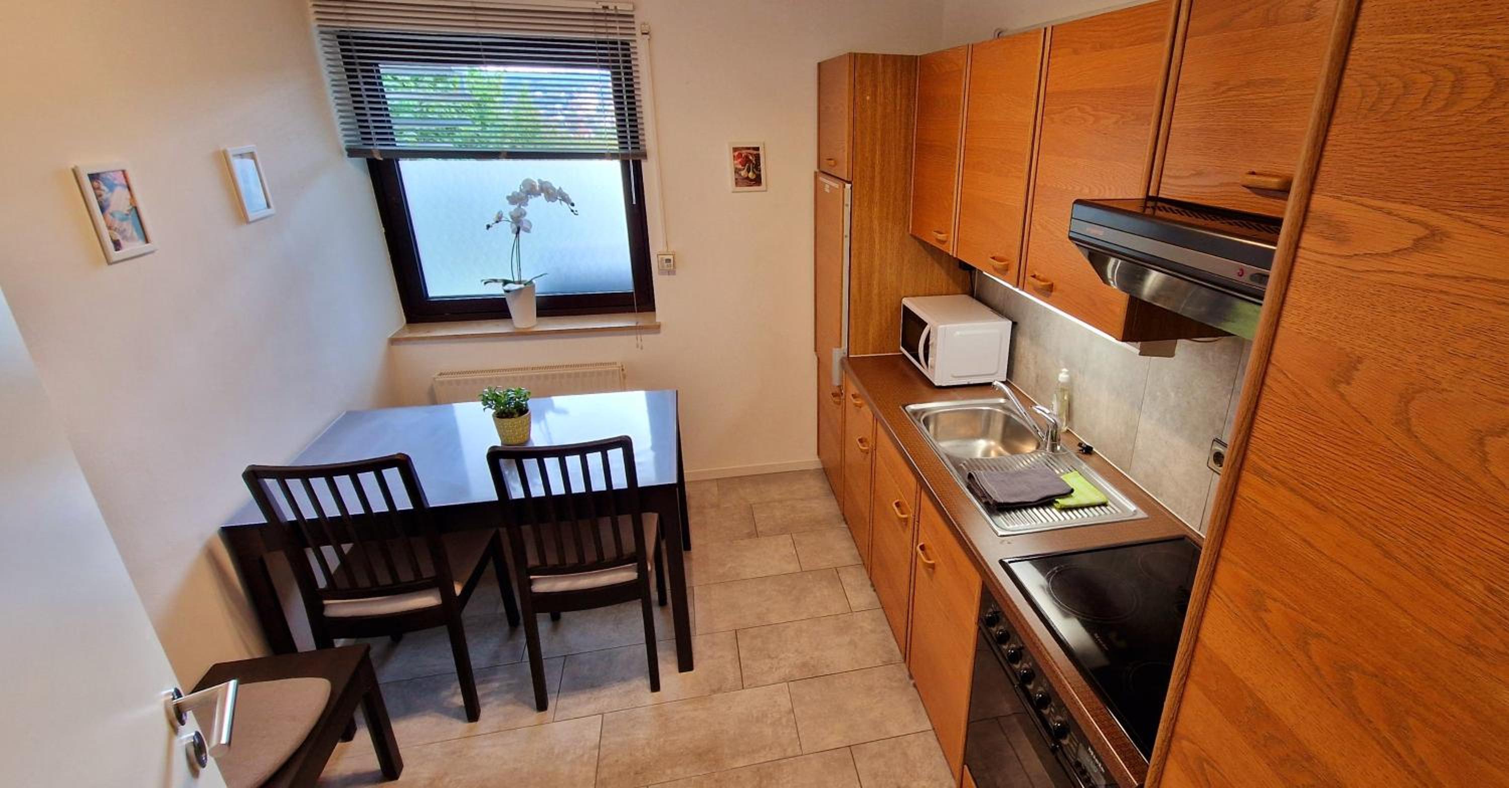 Three-Bedroom Apartment - Photo 3