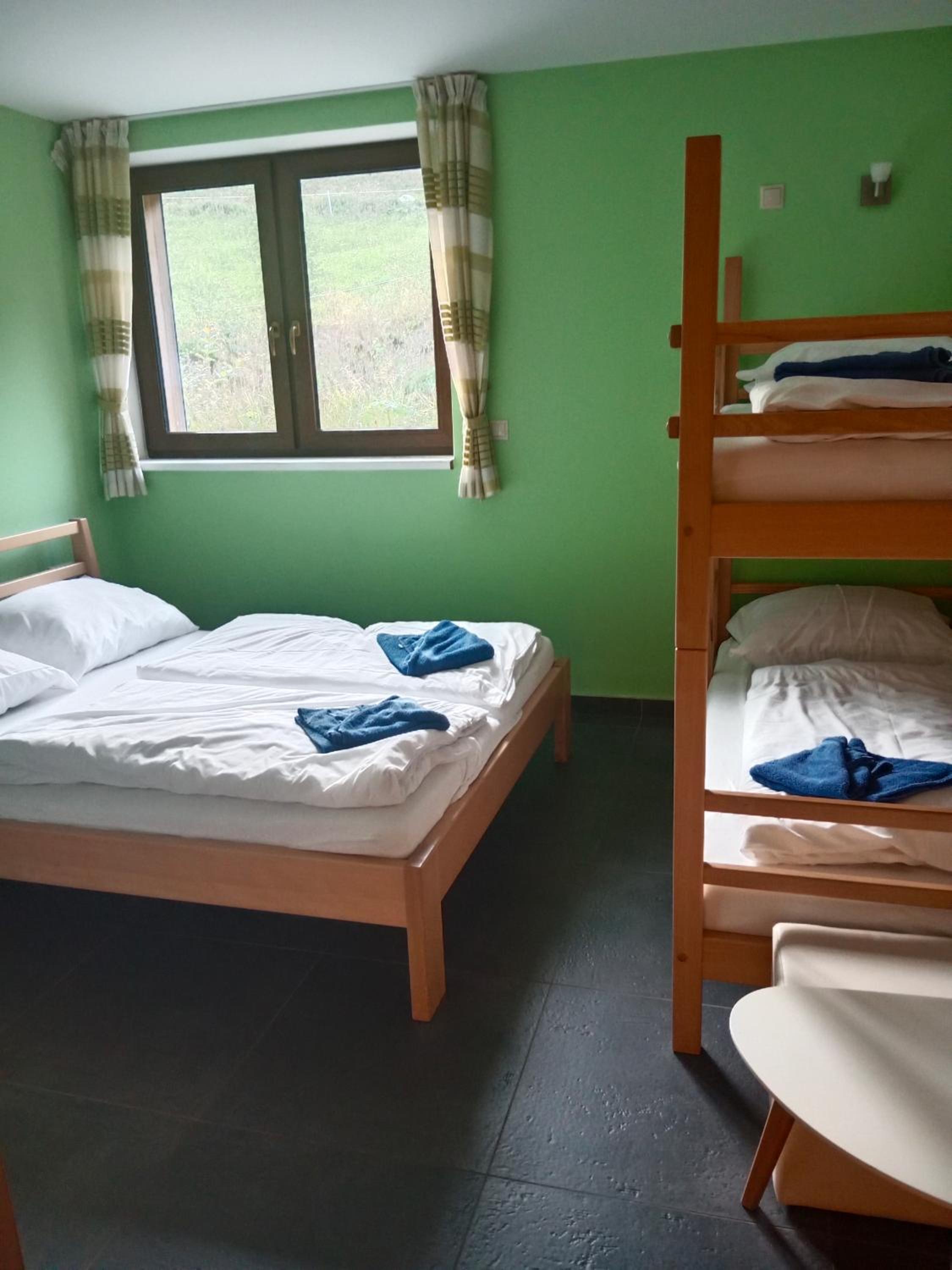 Quadruple Room with Private Bathroom photo 1
