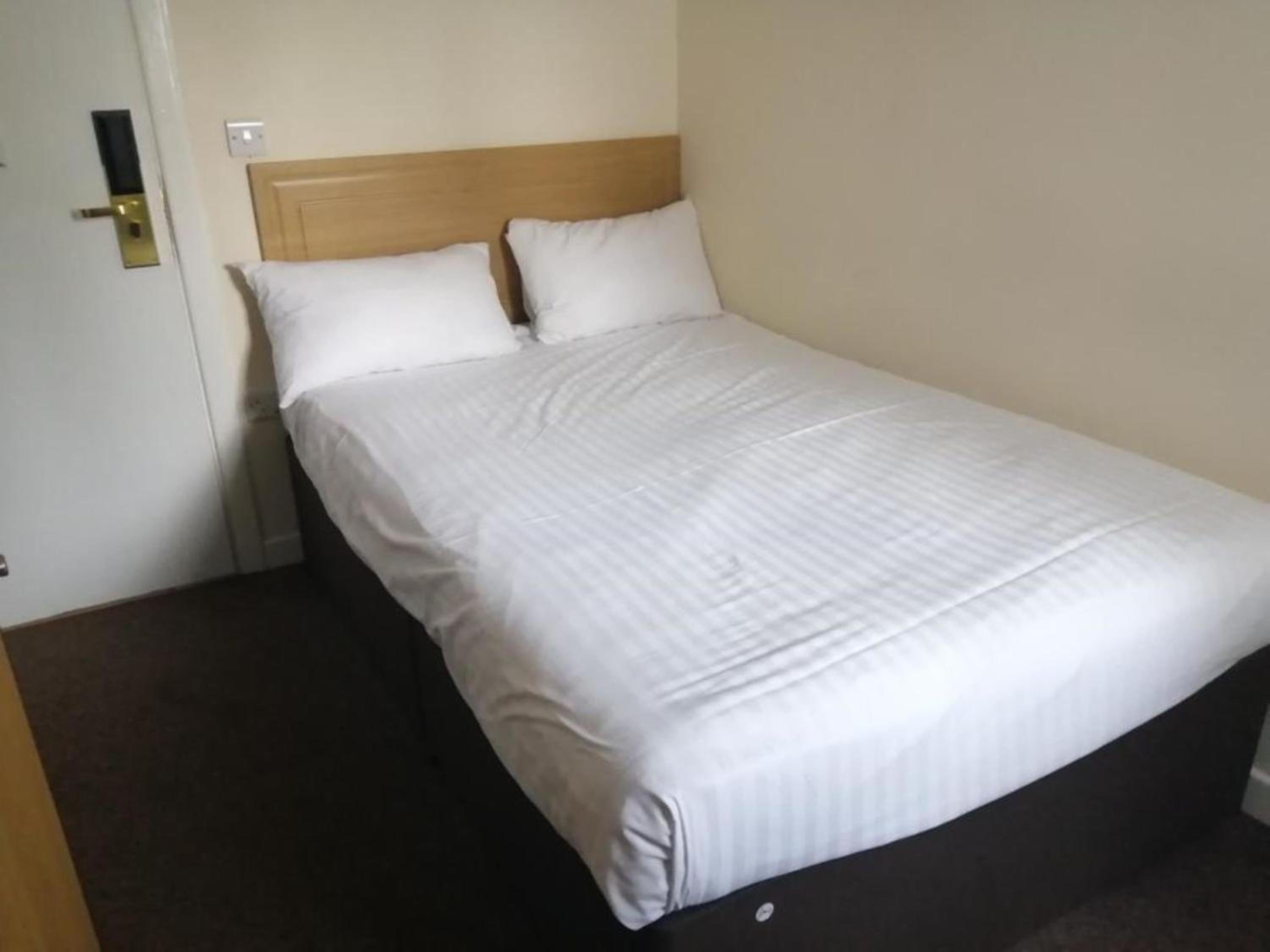Small Double Room No Window (Located in Annex Building) - Photo 1