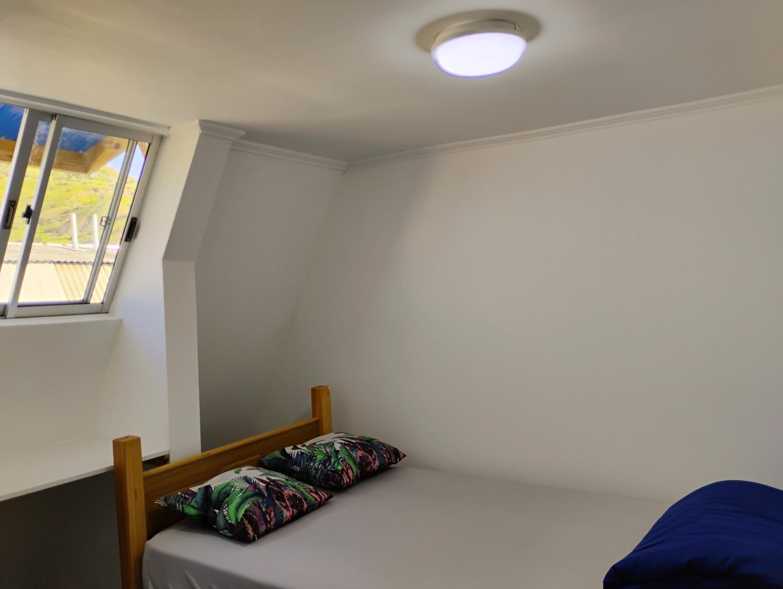 Single Bed in Dormitory Room