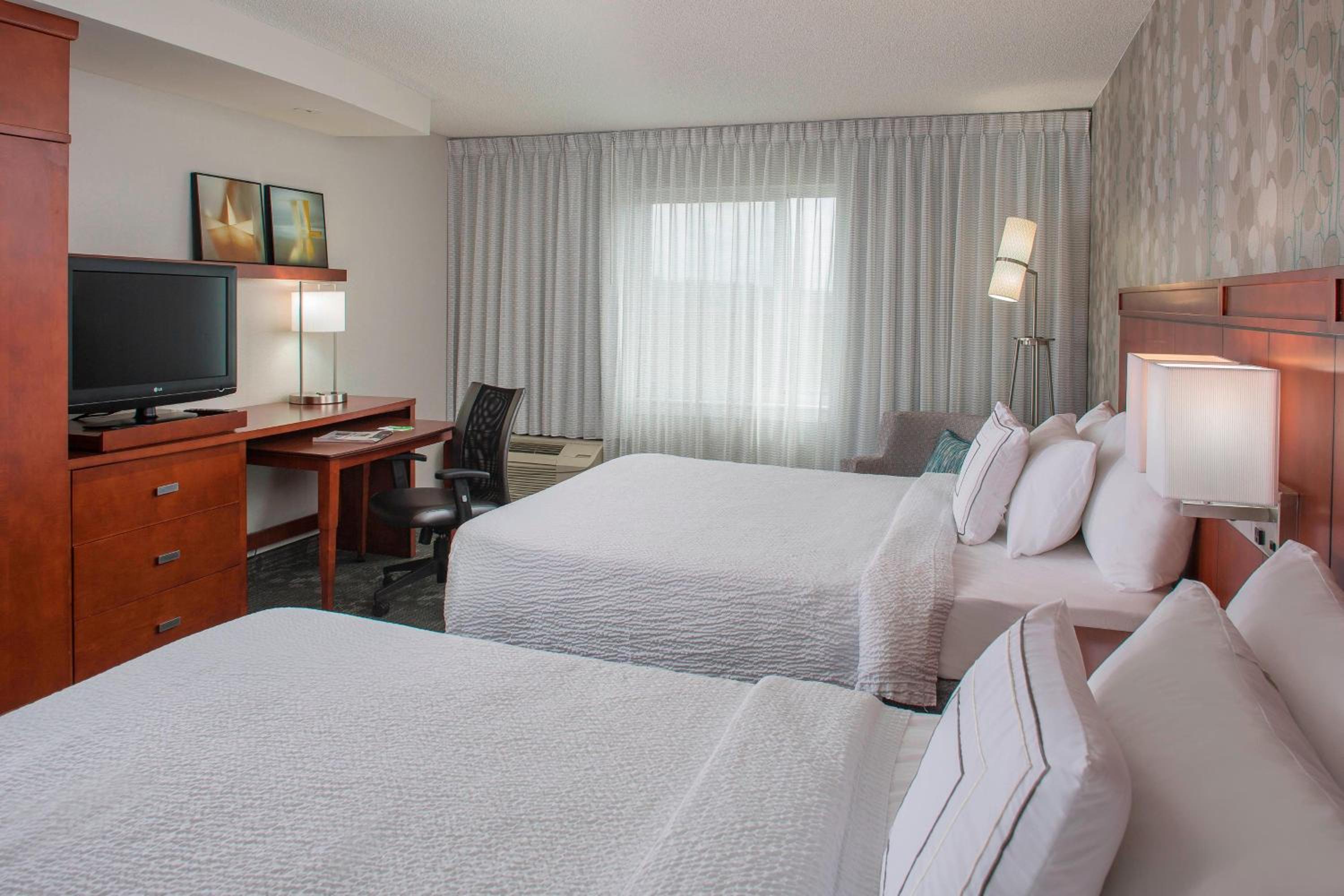 Queen Room with Two Queen Beds - Photo 1