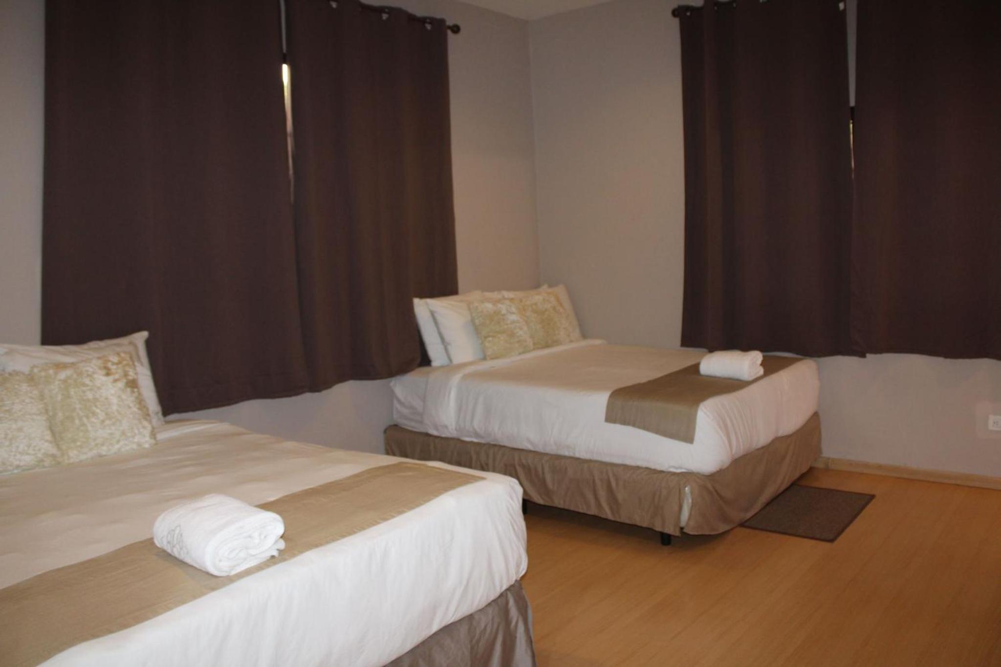Deluxe Queen Room With Two Queen Beds photo 2