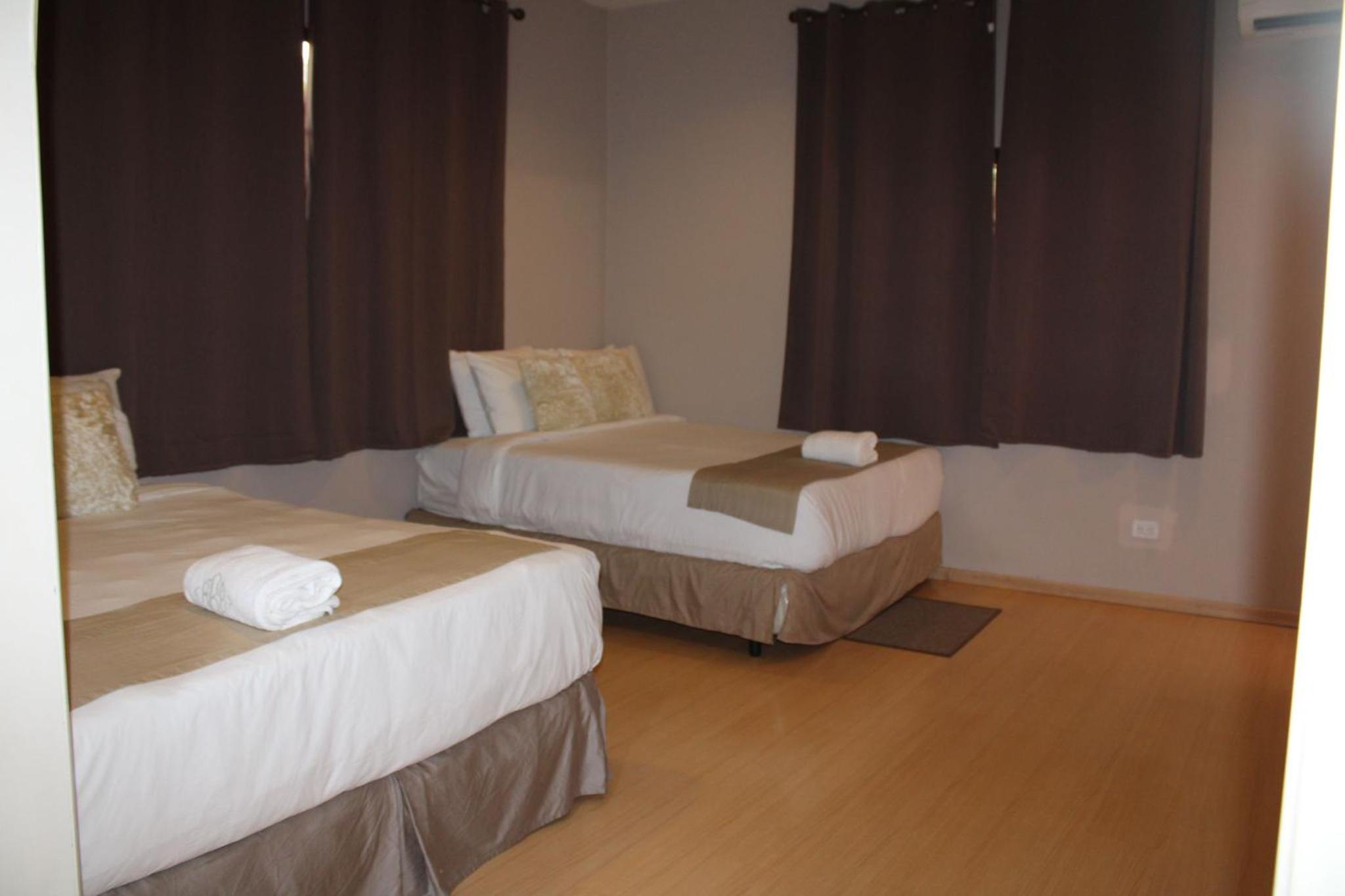 Deluxe Queen Room With Two Queen Beds photo 3