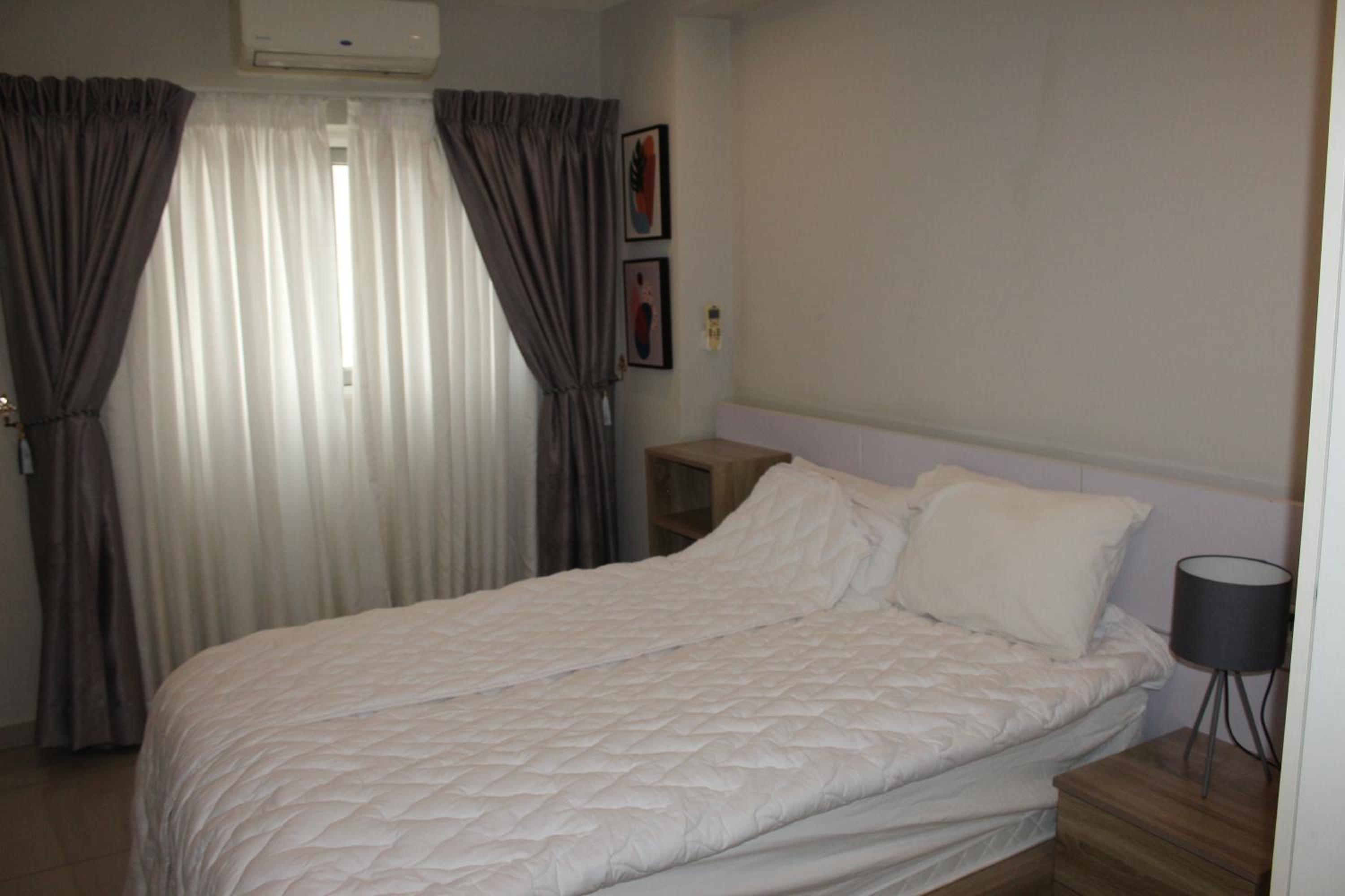 Three-Bedroom Apartment photo 2