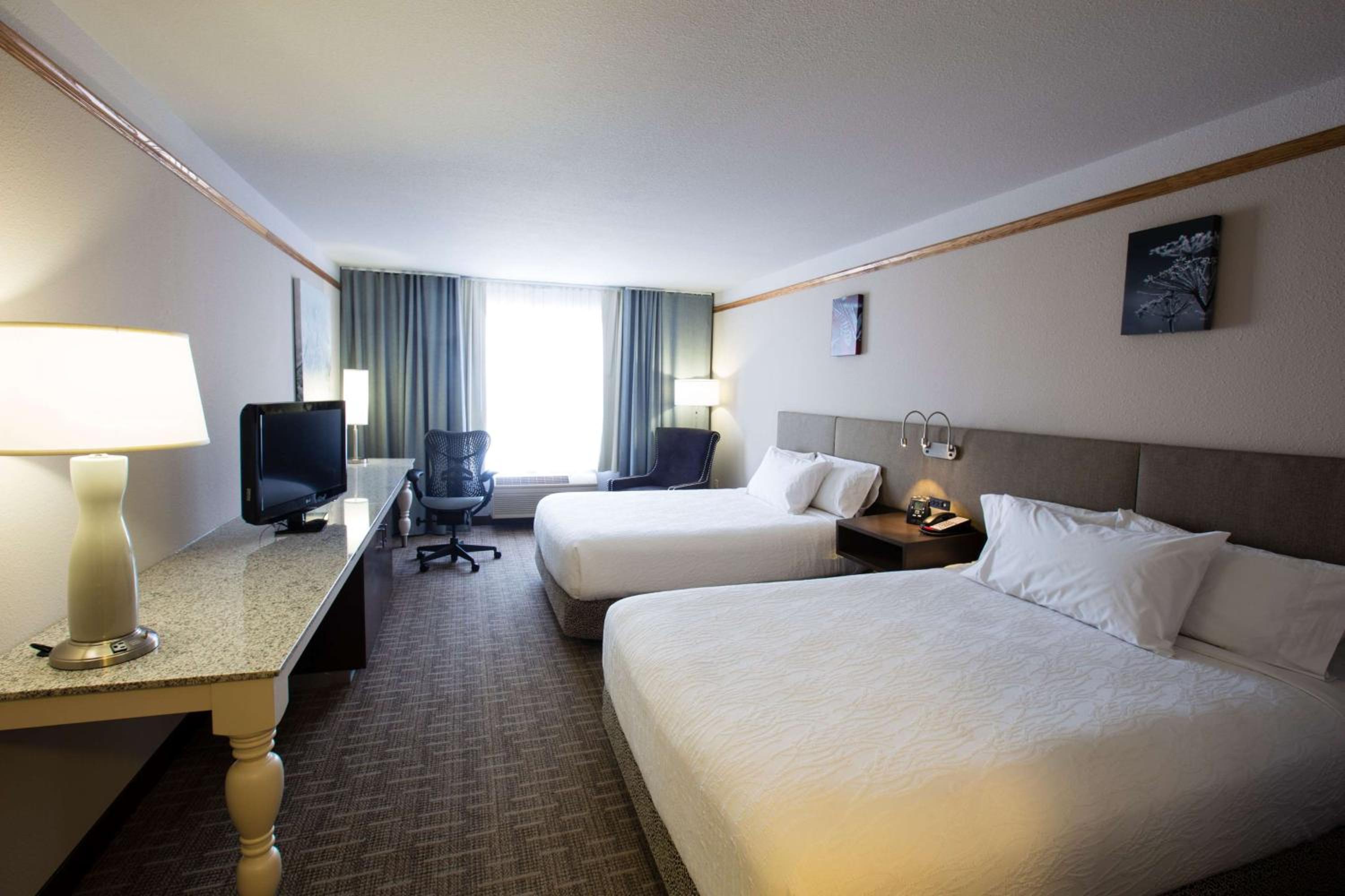 Queen Room with Two Queen Beds - Photo 1
