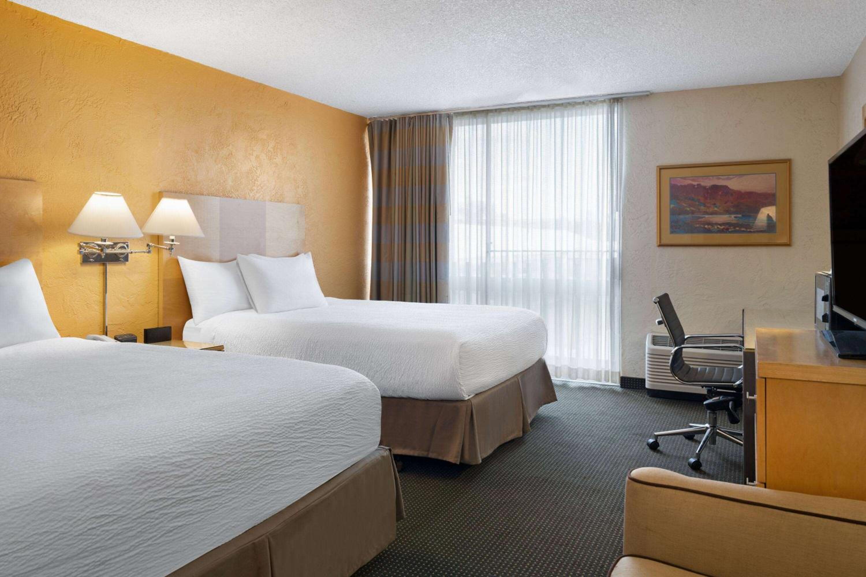 Deluxe Queen Room with Two Queen Beds - Non-Smoking photo 1