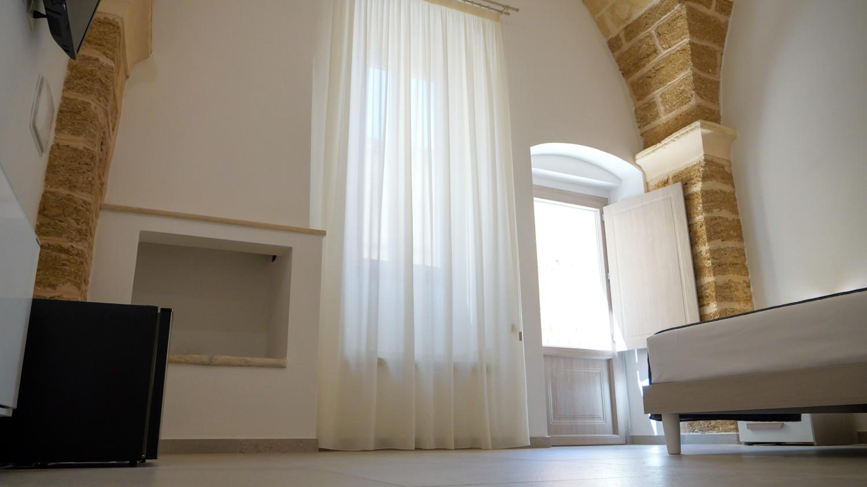 Deluxe Triple Room - Photo 21