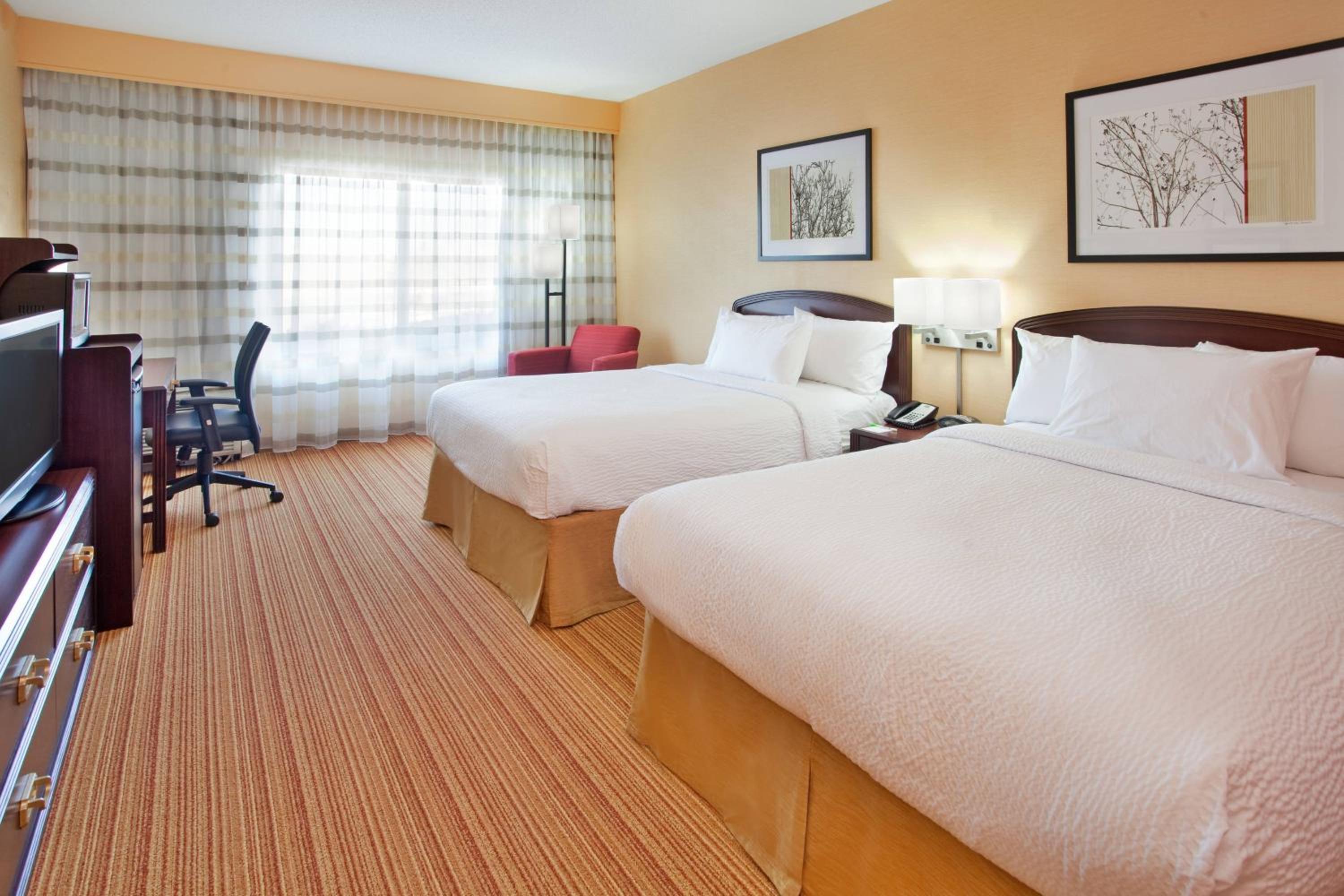 Queen Room with Two Queen Beds - Photo 1