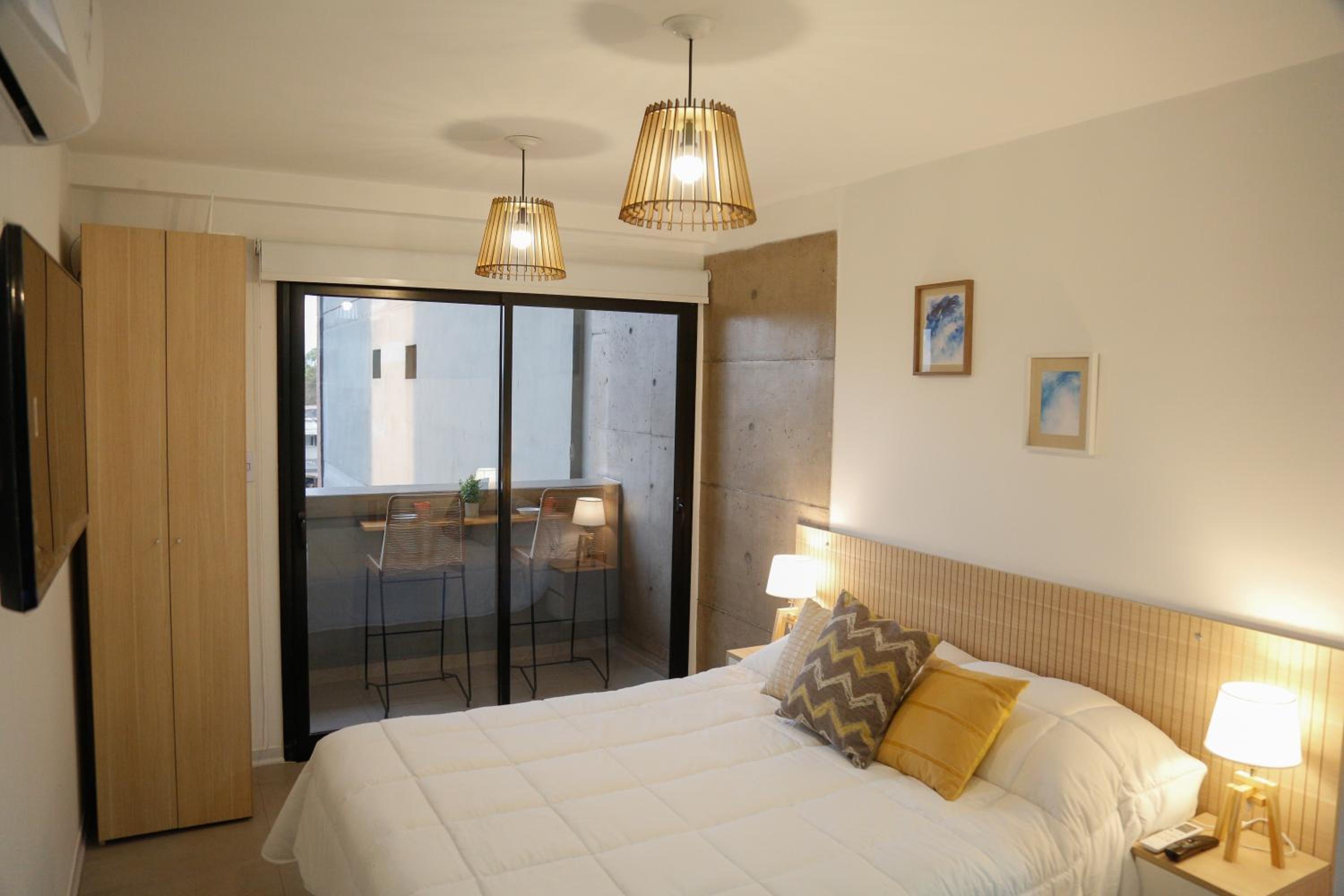 One-Bedroom Apartment with Balcony and City View photo 1