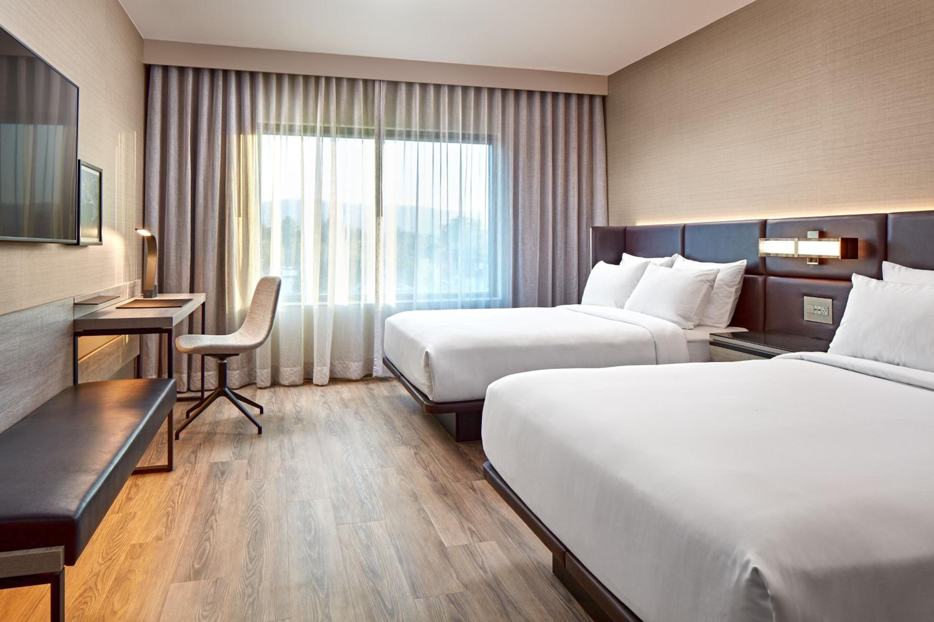 Standard Queen Room with Two Queen Beds - Photo 1