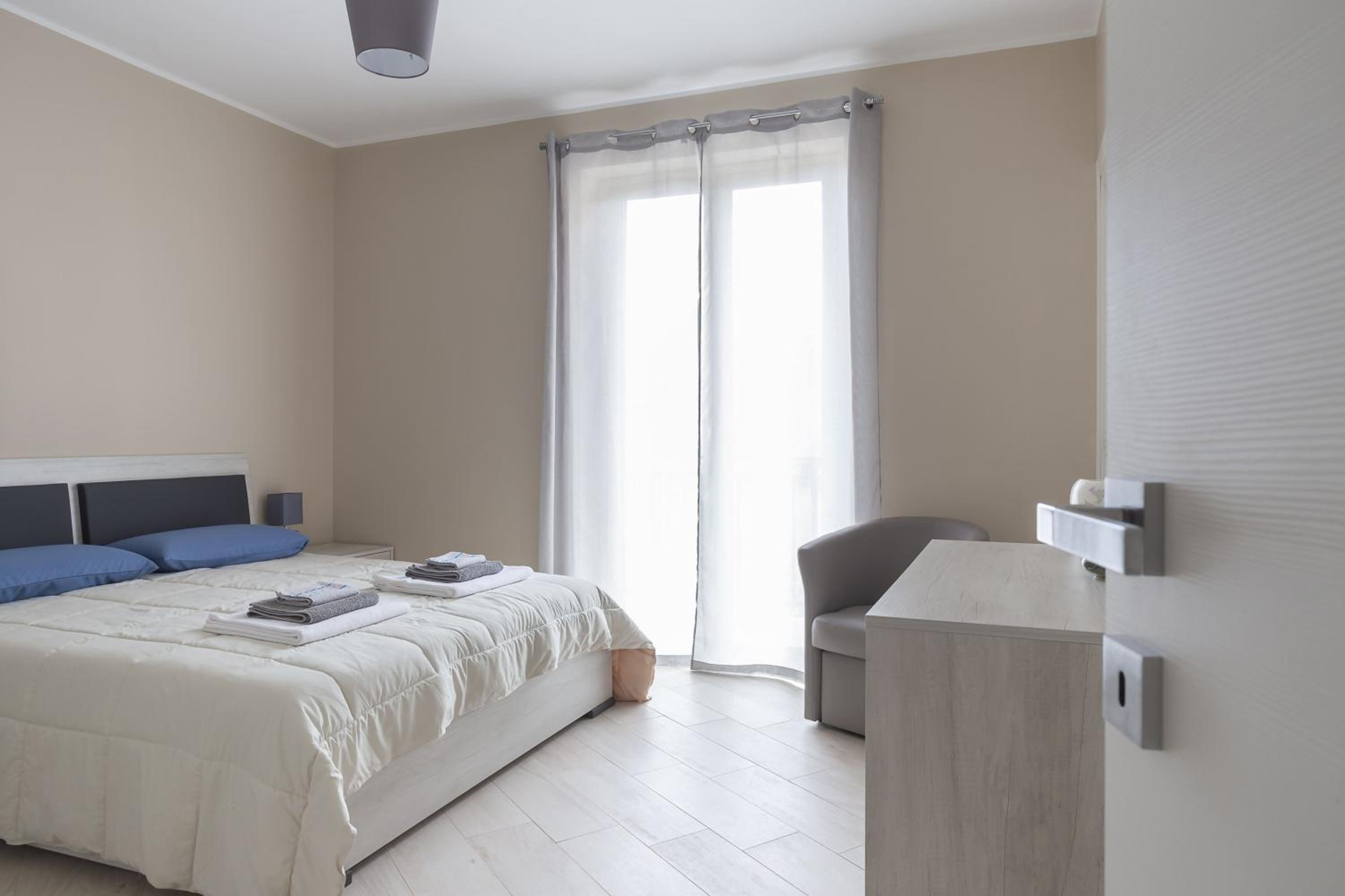 Three-Bedroom Apartment - Photo 18