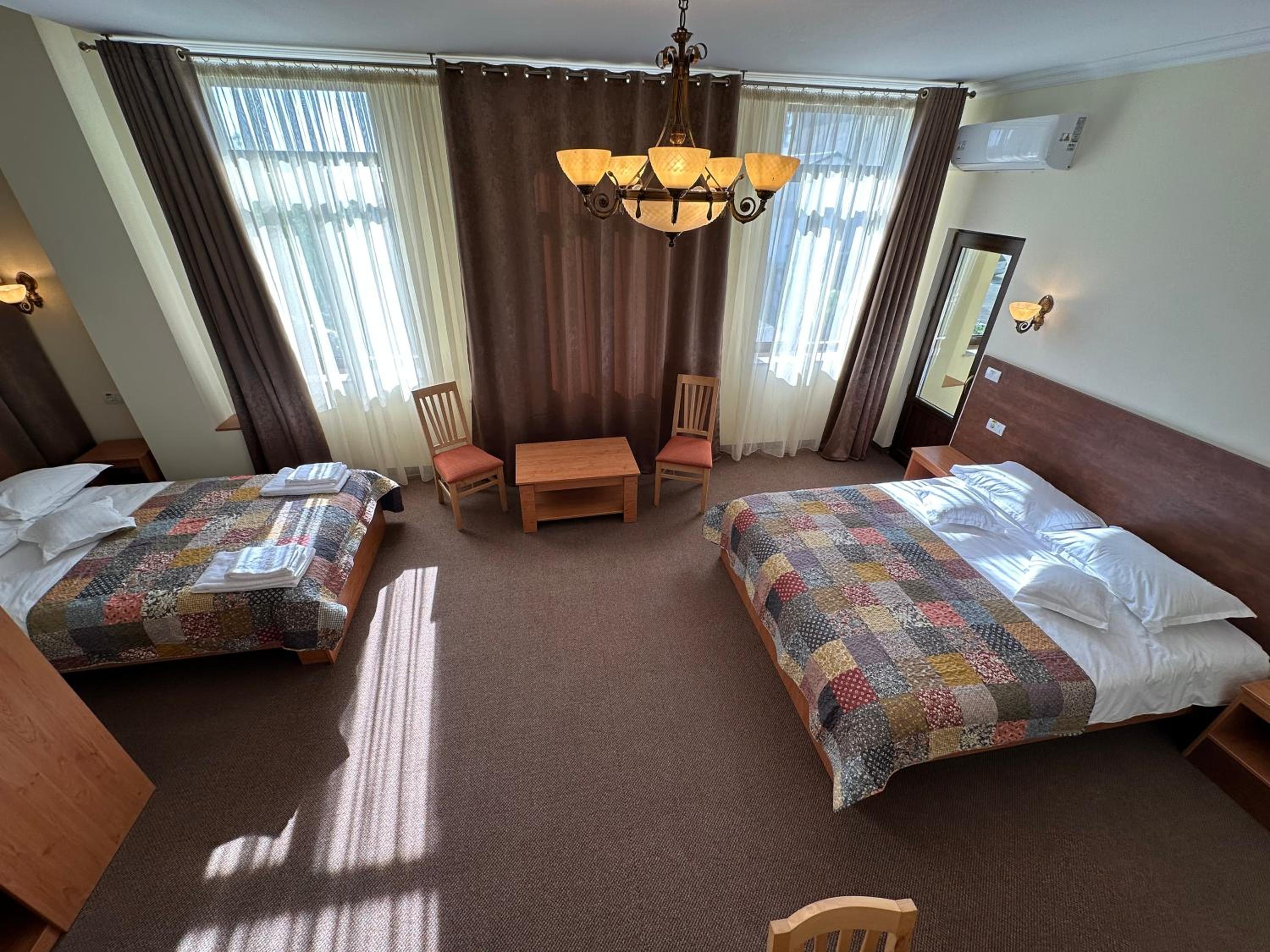 Deluxe Family Suite - Photo 2