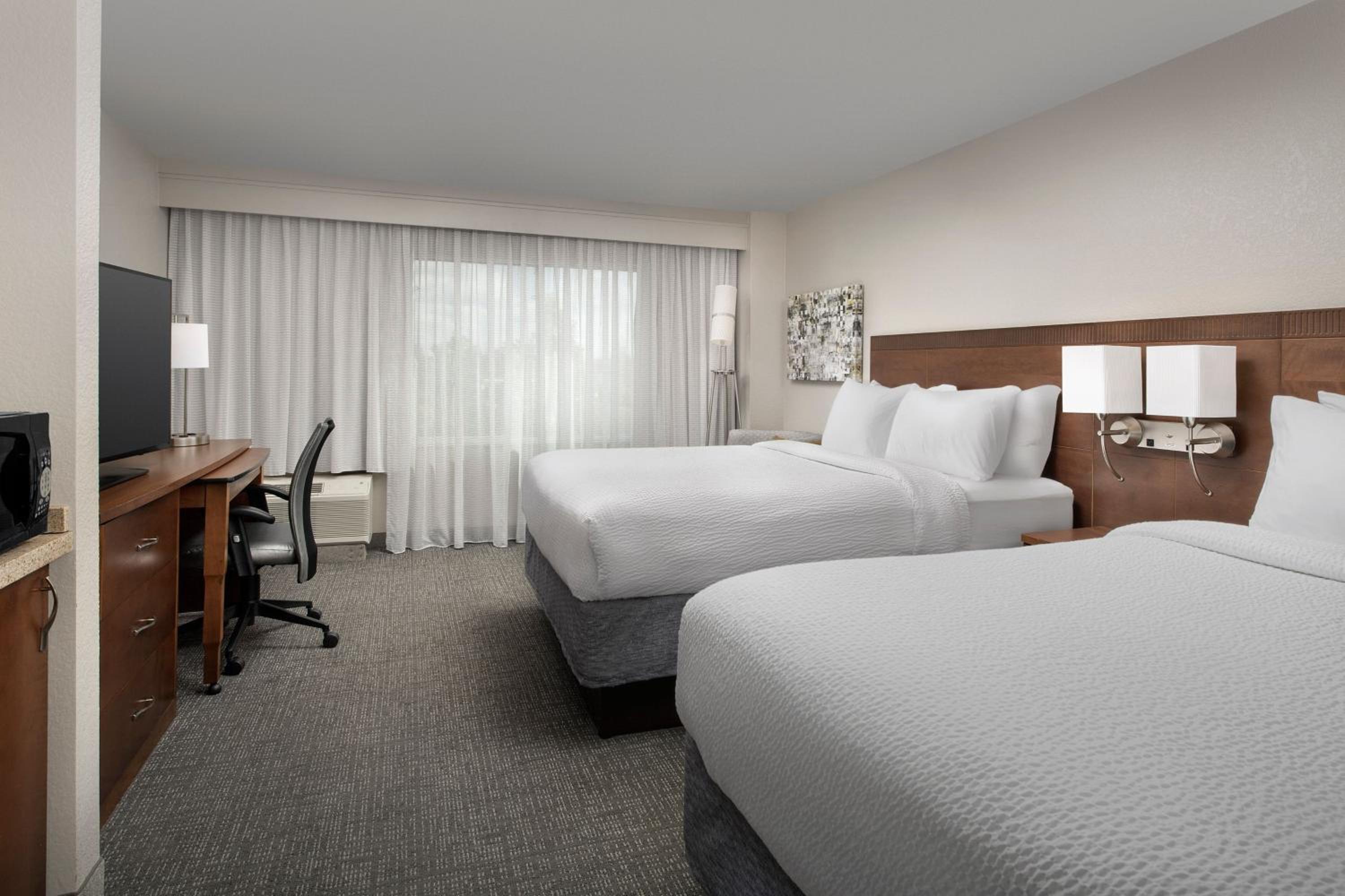 Queen Room with Two Queen Beds - Photo 1