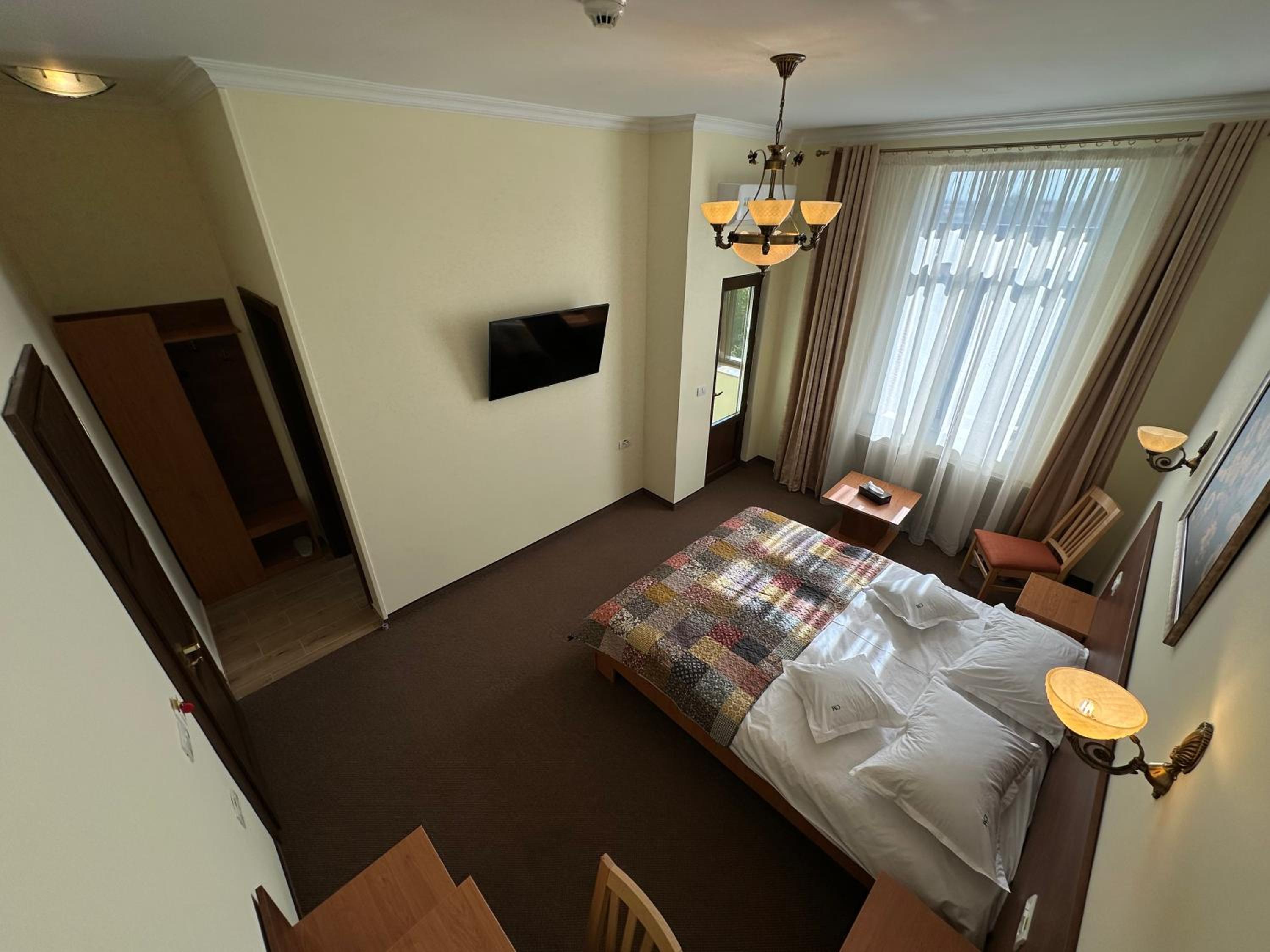 Deluxe Double Room with Balcony - Photo 18
