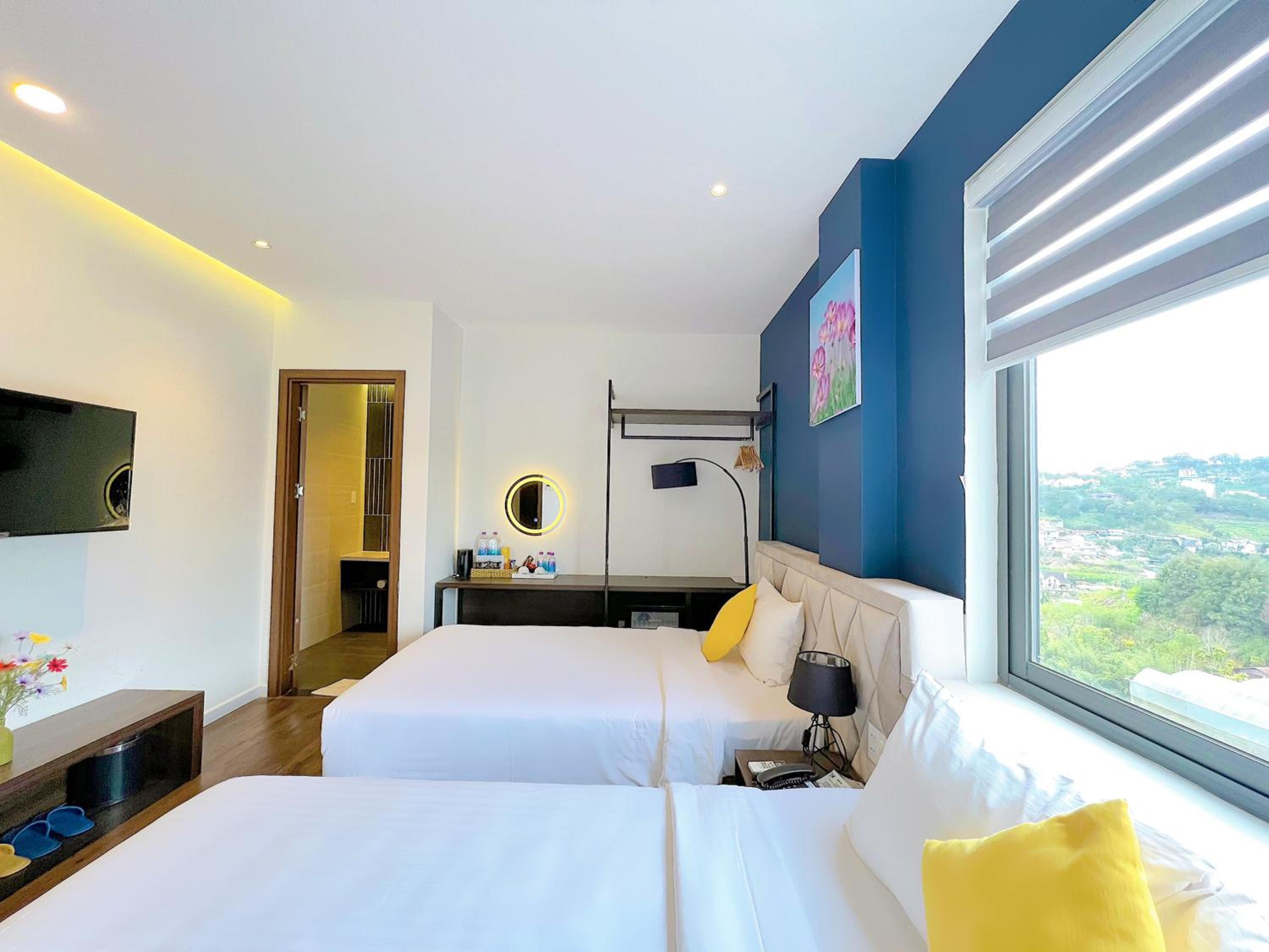 Deluxe Triple Room - Photo 1