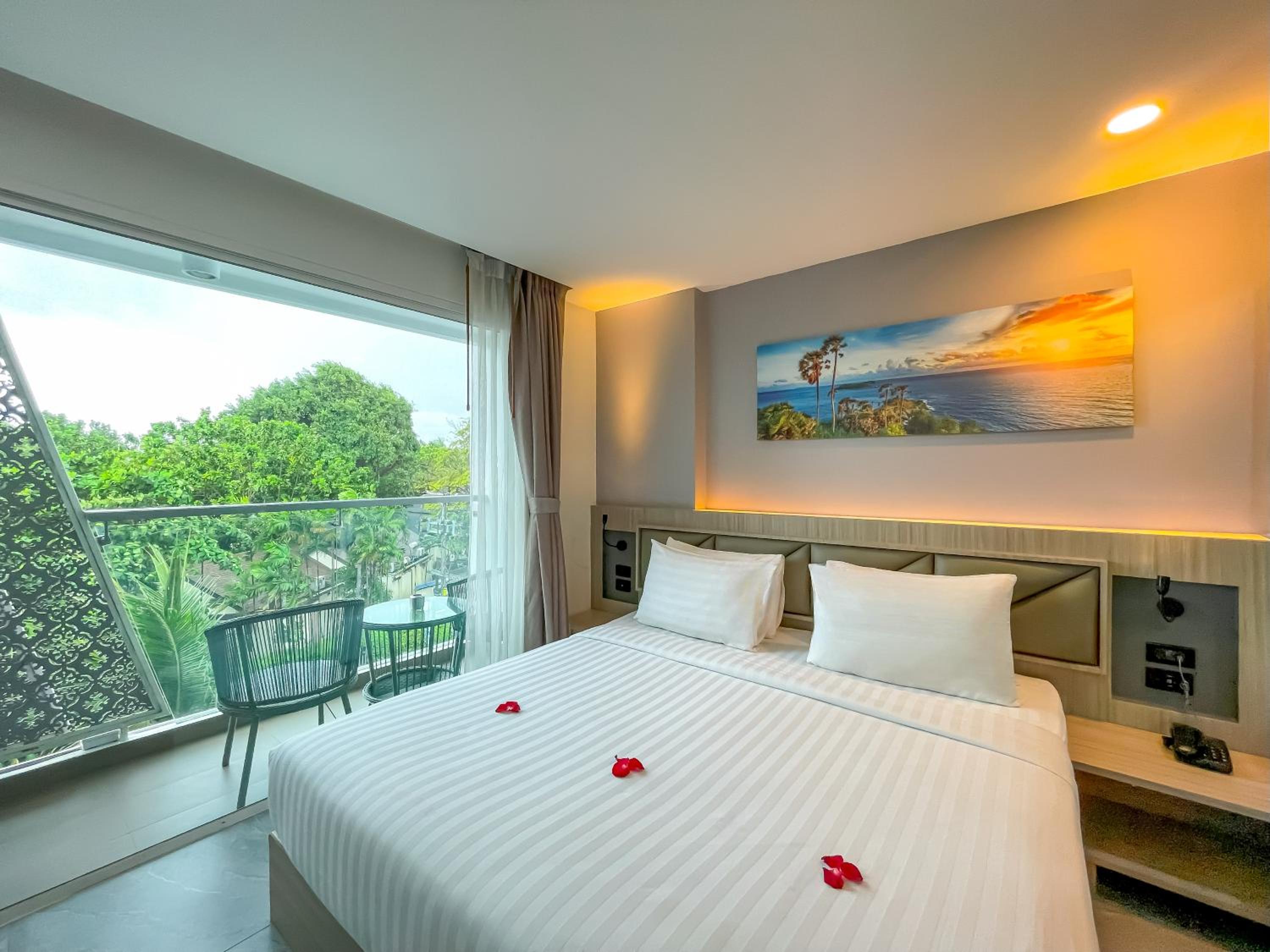 Deluxe King Room with Balcony and City View