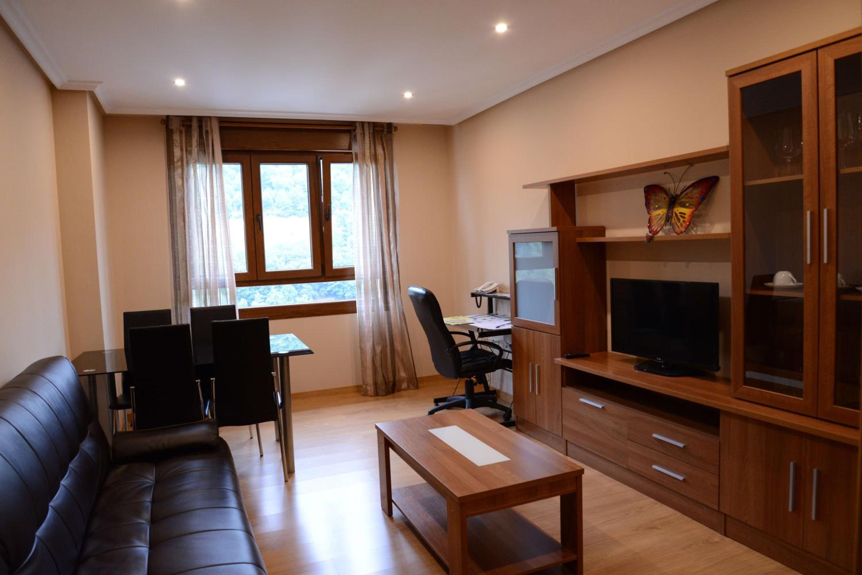 Three-Bedroom Apartment - Photo 1