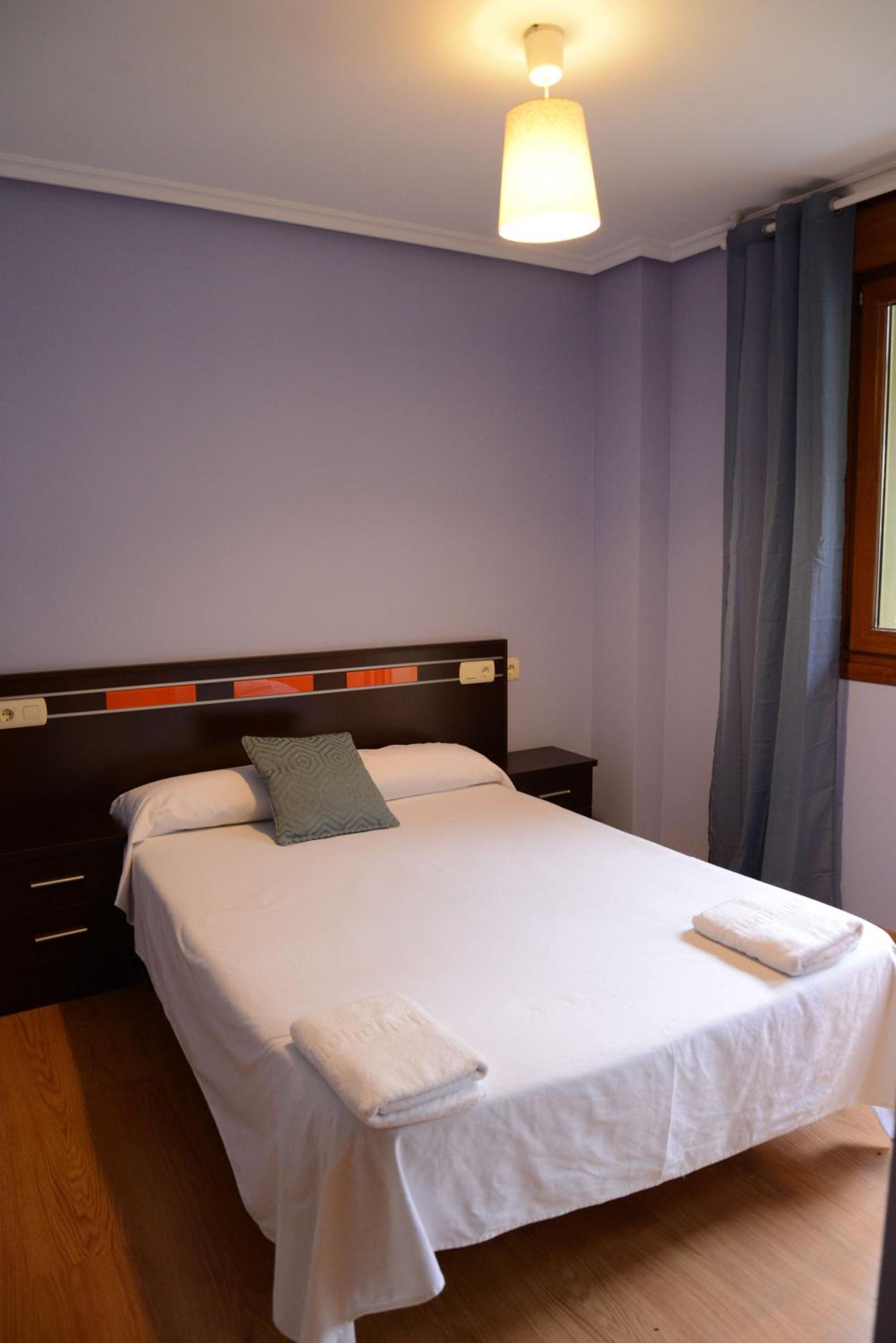 Three-Bedroom Apartment - Photo 2