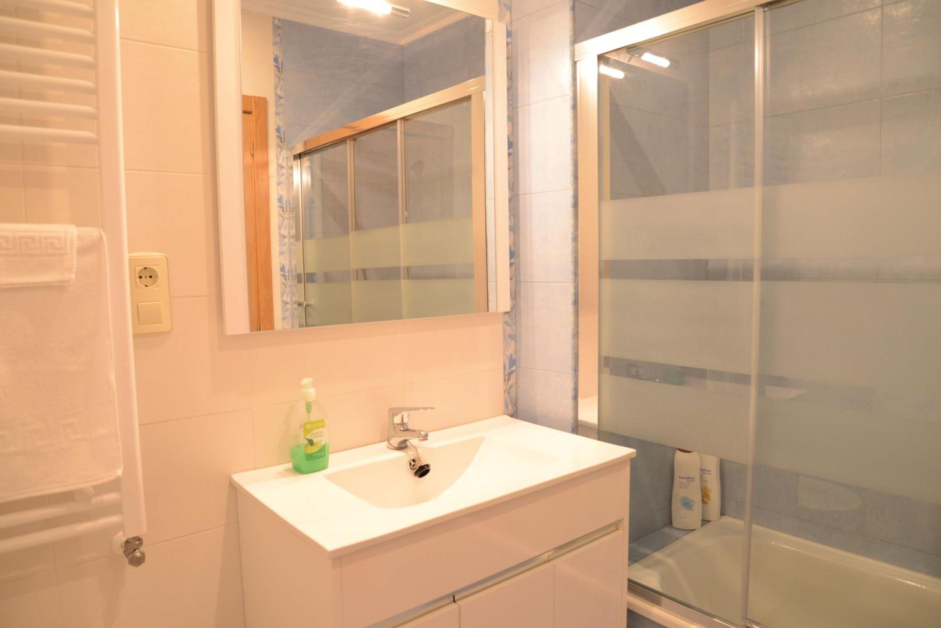 Three-Bedroom Apartment - Photo 18