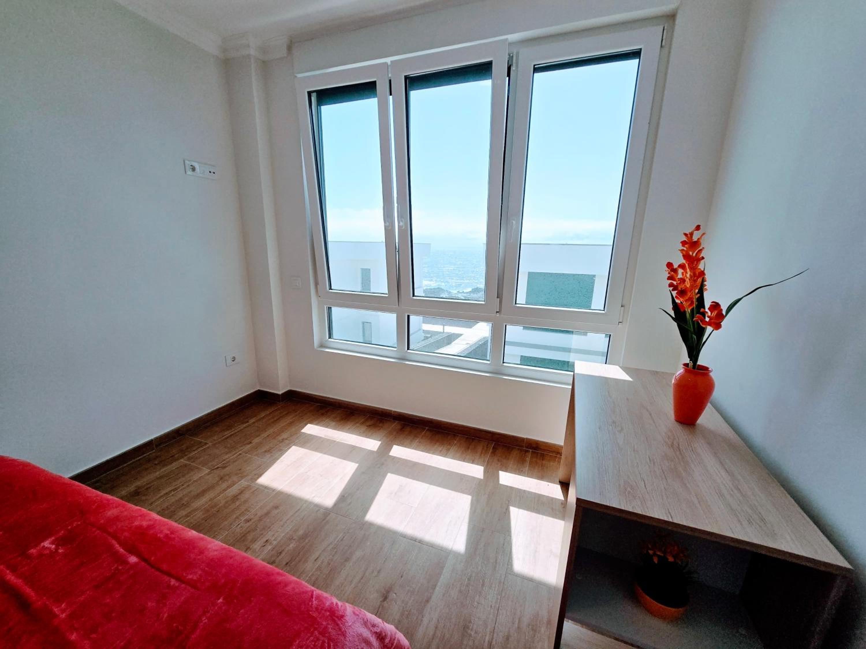 Three-Bedroom Apartment with Balcony photo 2