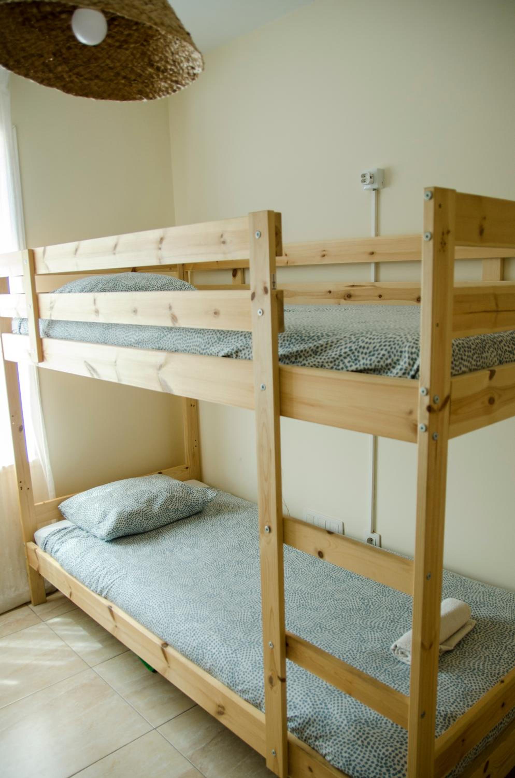 Cama en habitación compartida de 4 camas