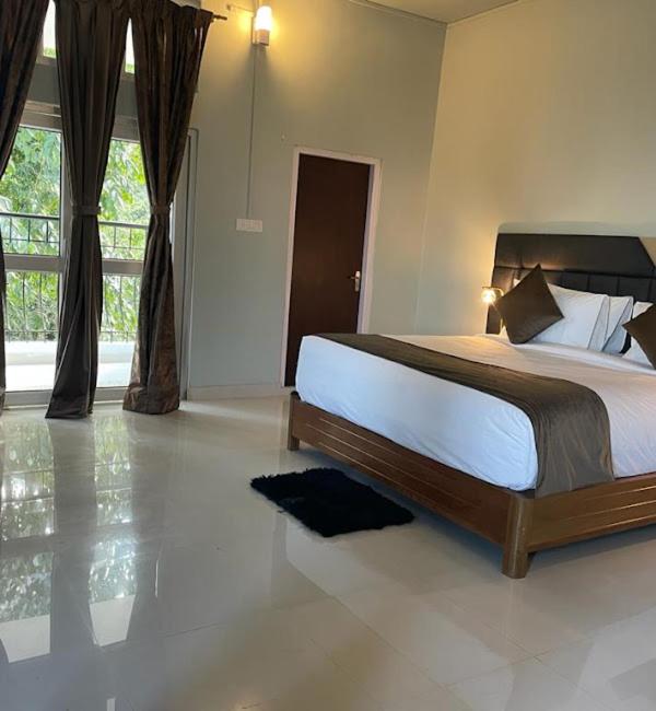Deluxe Room - Photo 1