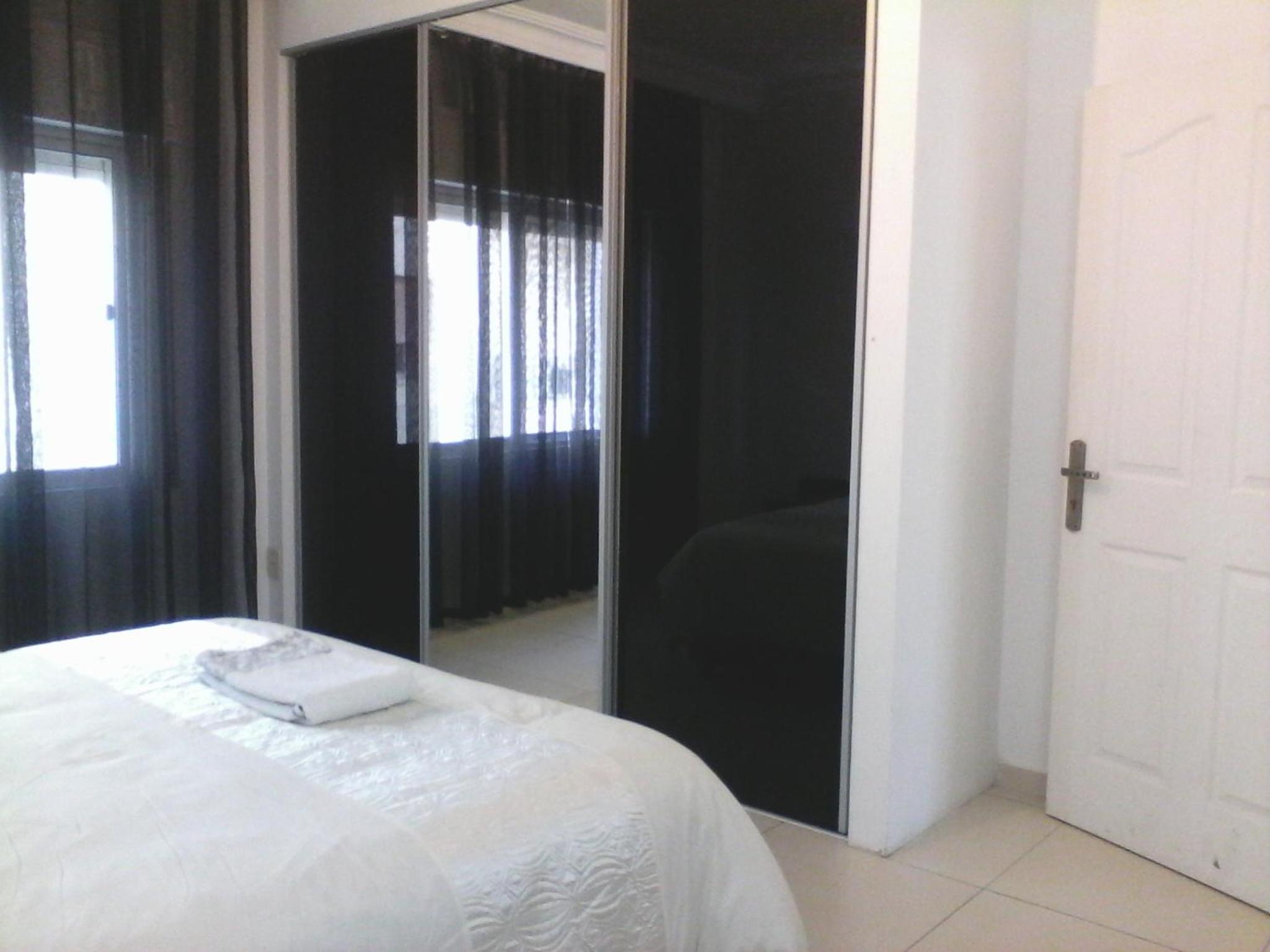 Three-Bedroom Apartment with Balcony