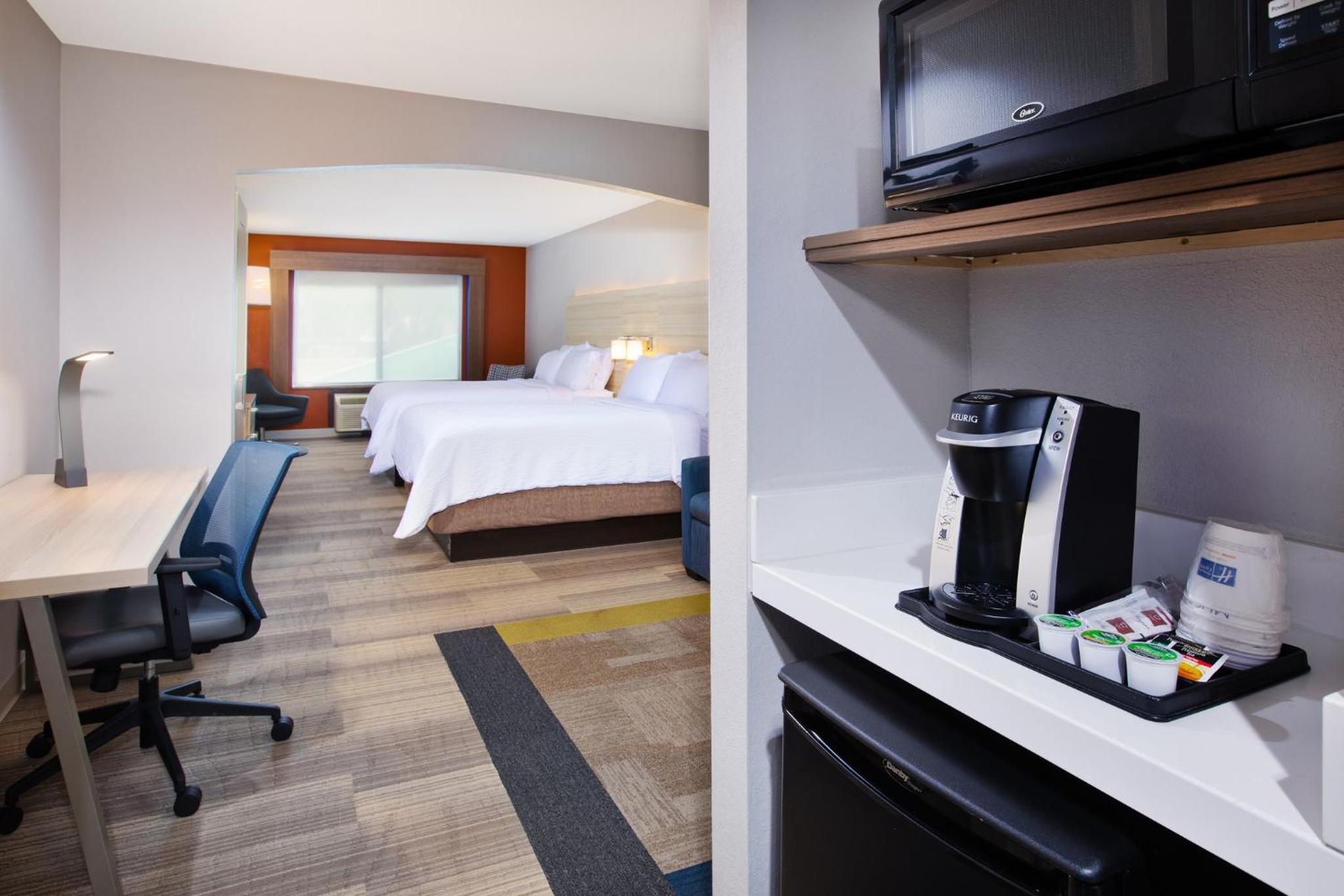 Queen Suite with Two Queen Beds and Sofa Bed - Photo 1