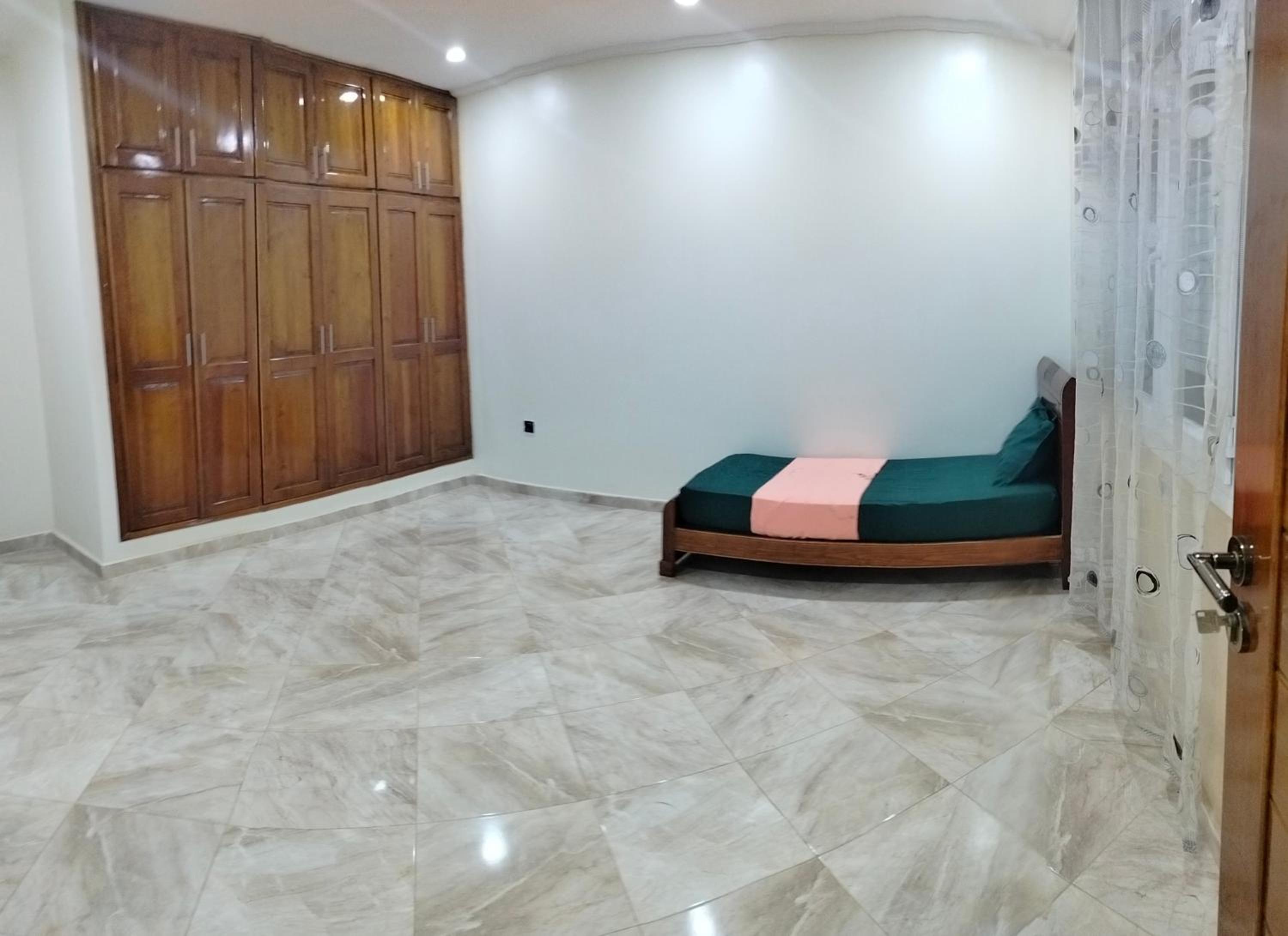Three-Bedroom Apartment photo 1
