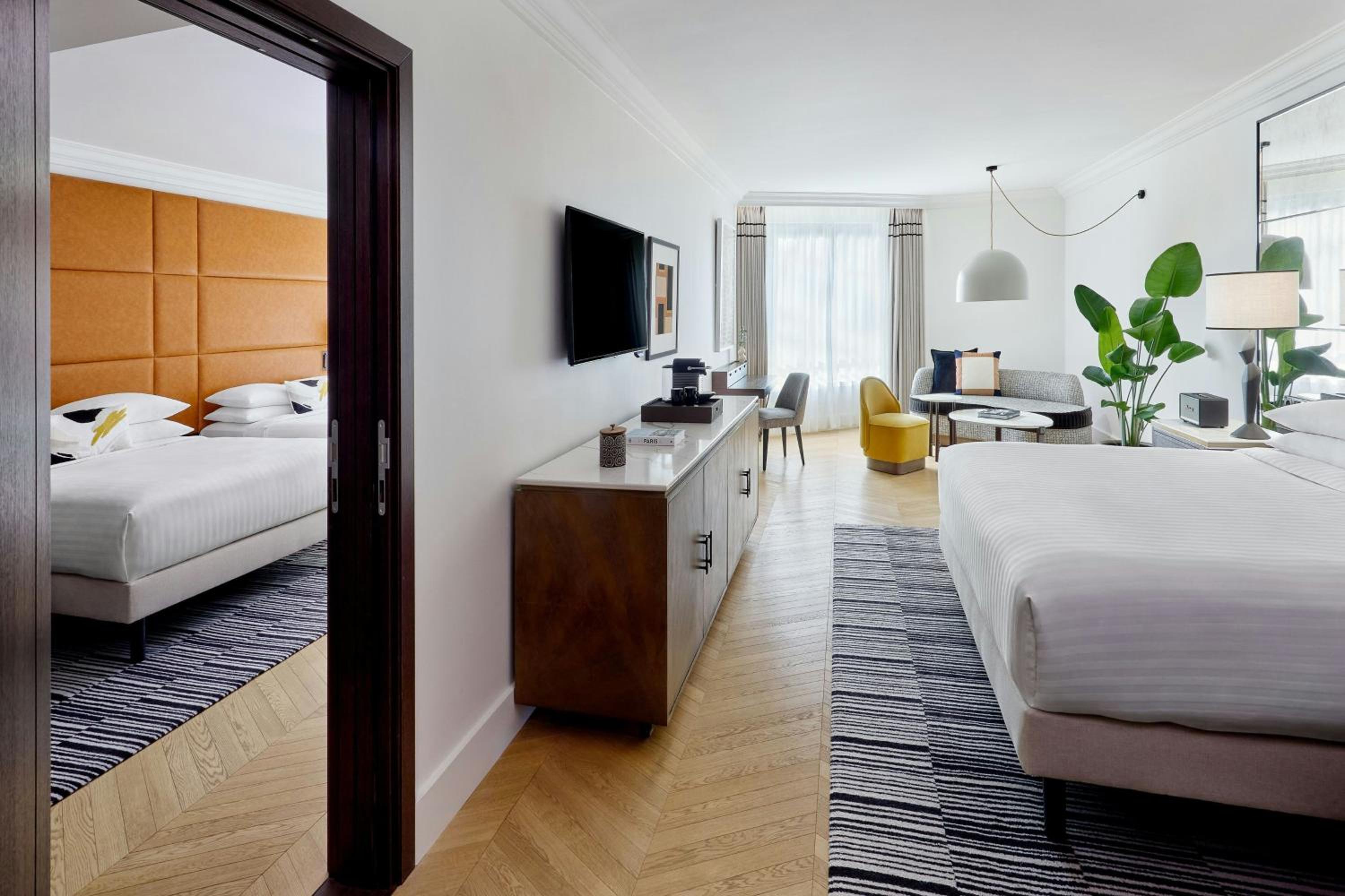 Two-Bedroom Parisian Family Suite with Atrium View thumbnail 6
