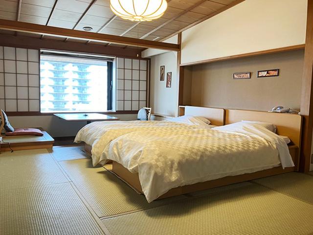 Japanese-Style Room with Beds & Open Air Bath-River Side - Non-Smoking photo 1
