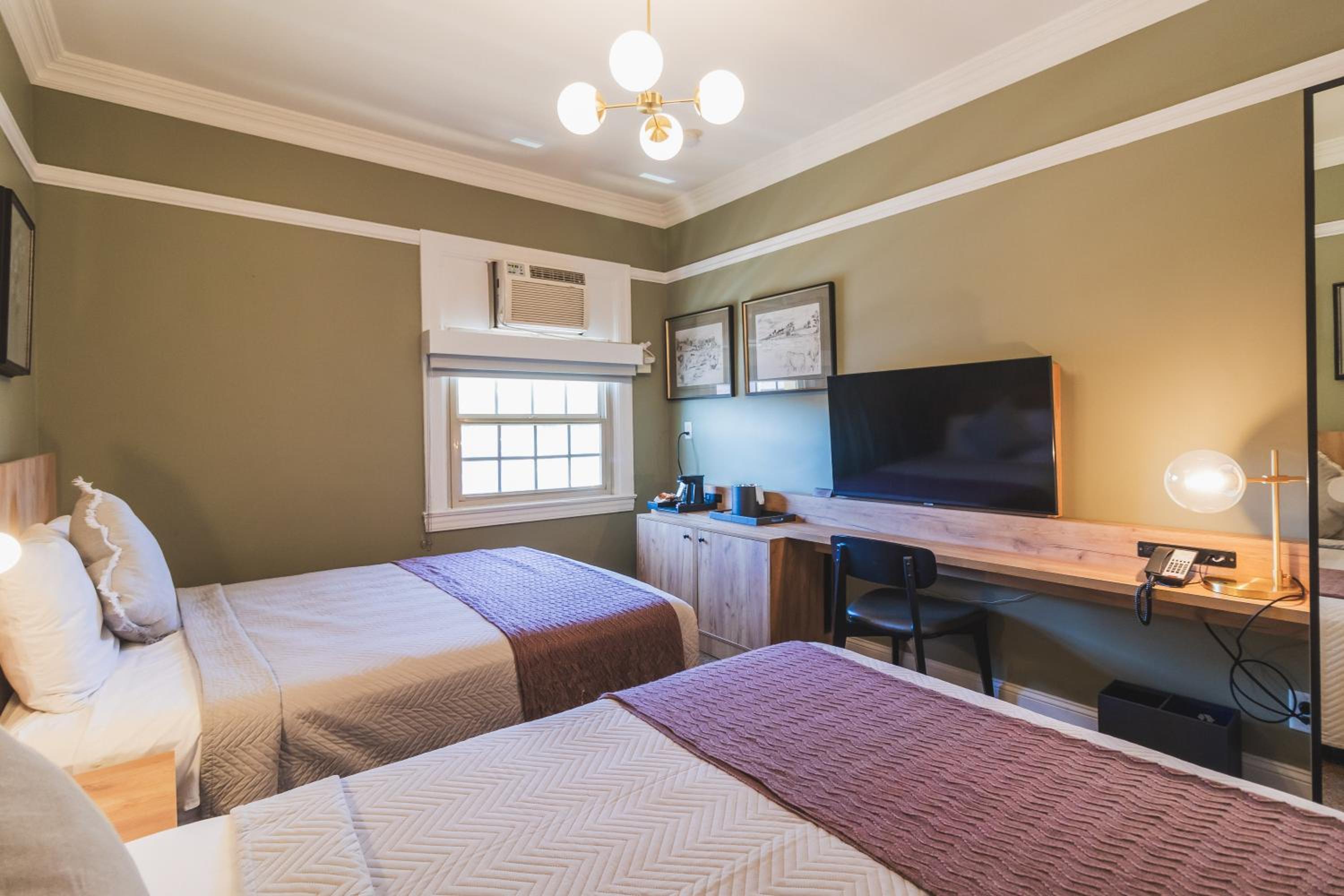 Standard Queen Room with Two Queen Beds - Photo 1