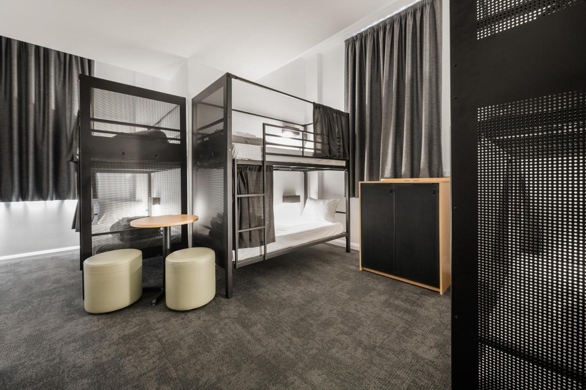Bed in 6-Bed Female Dormitory Room with Shared Bathroom