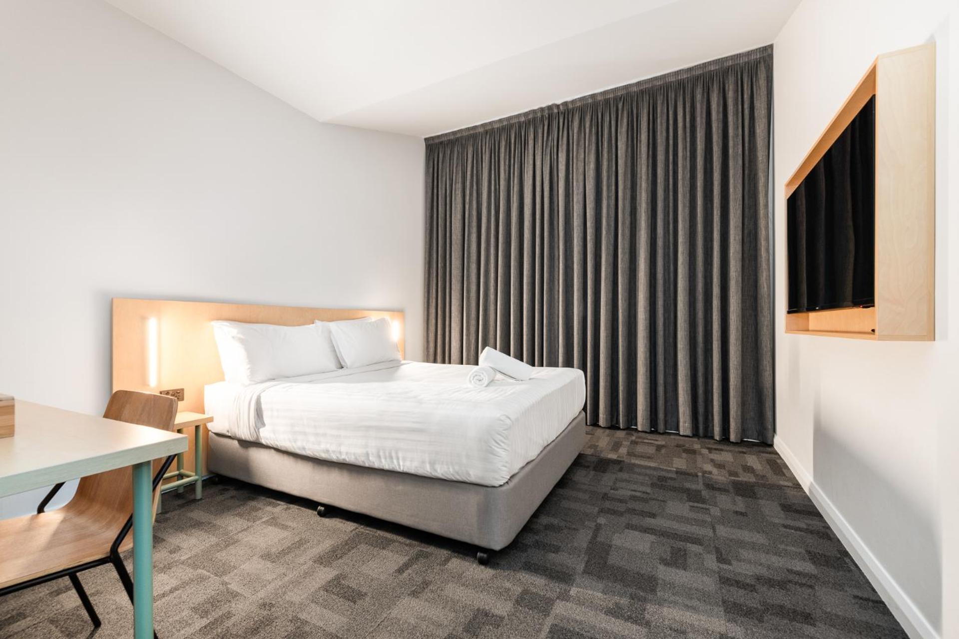 Queen Room with Shared Bathroom