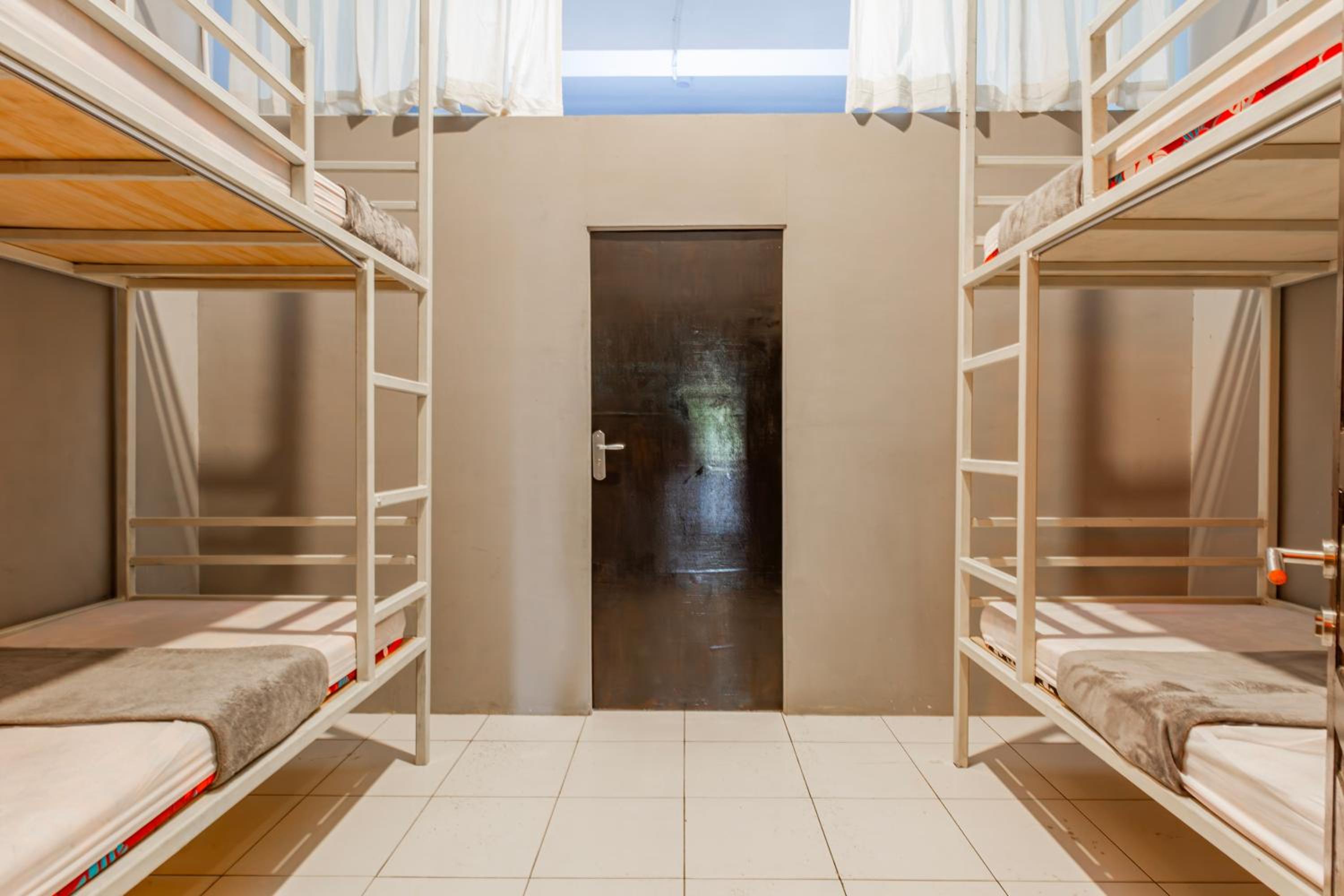 Single Bed In Female Dormitory Room