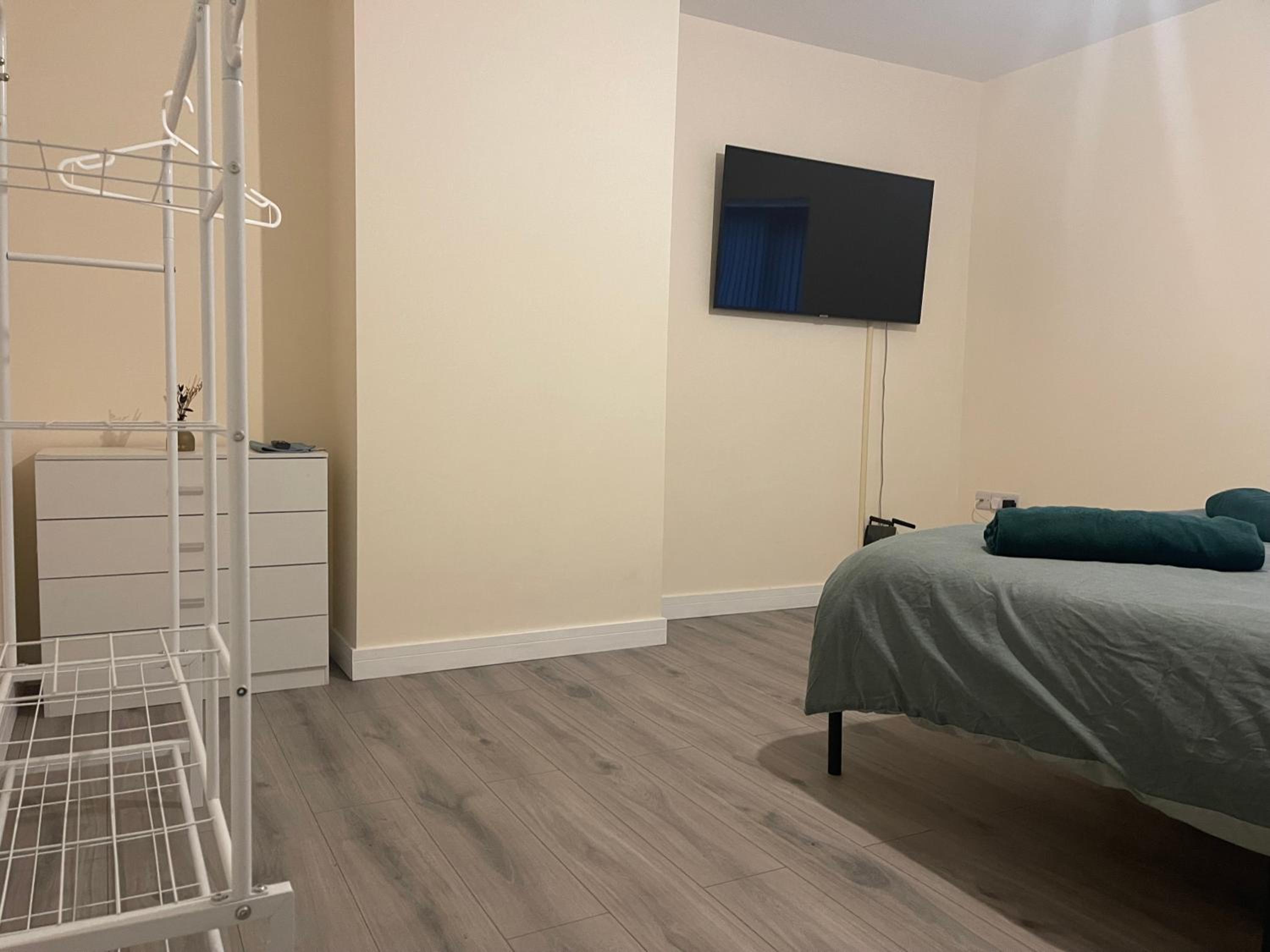 Three-Bedroom Apartment photo 2