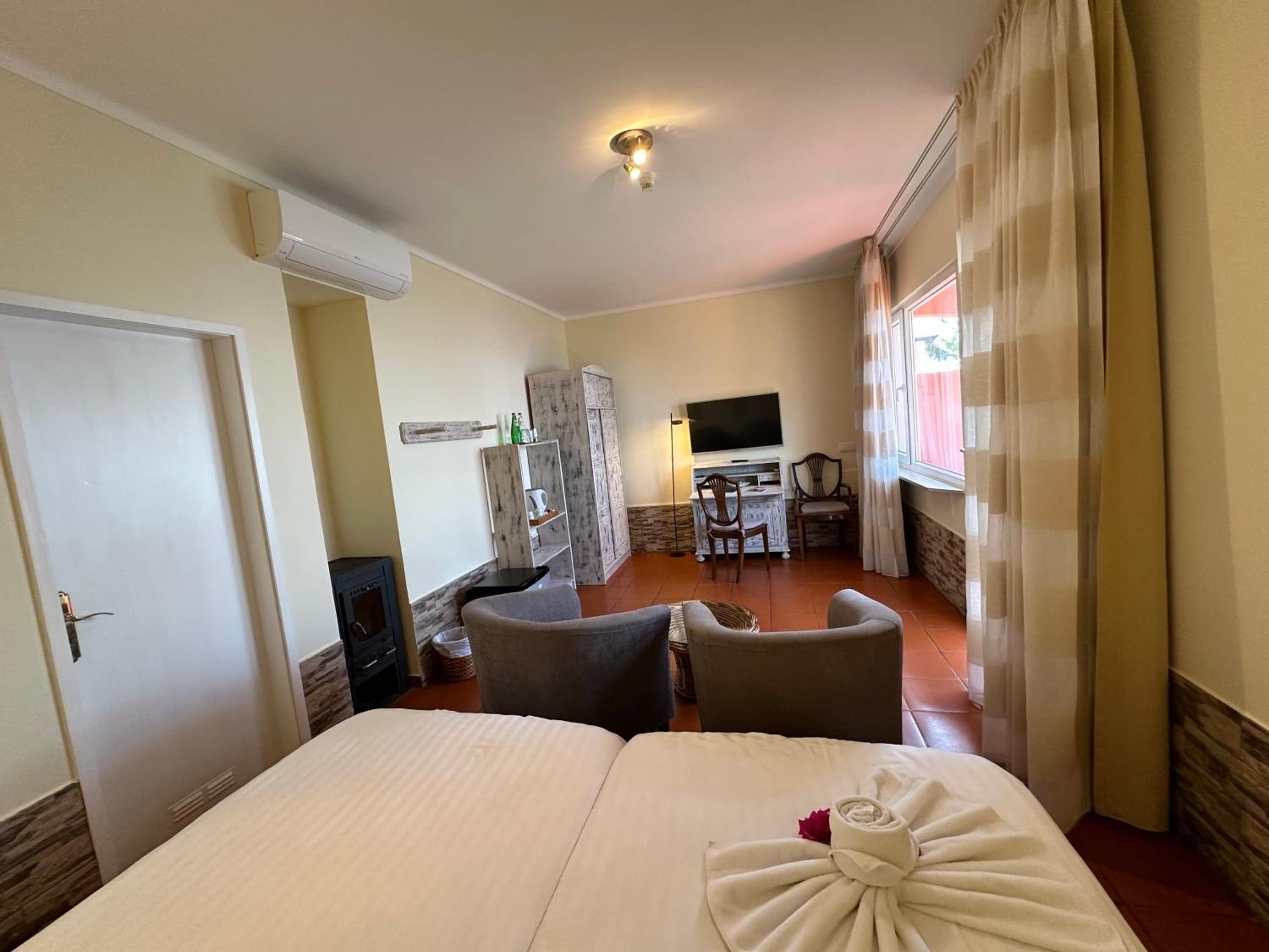 Standard Twin Room with Garden View - Photo 1