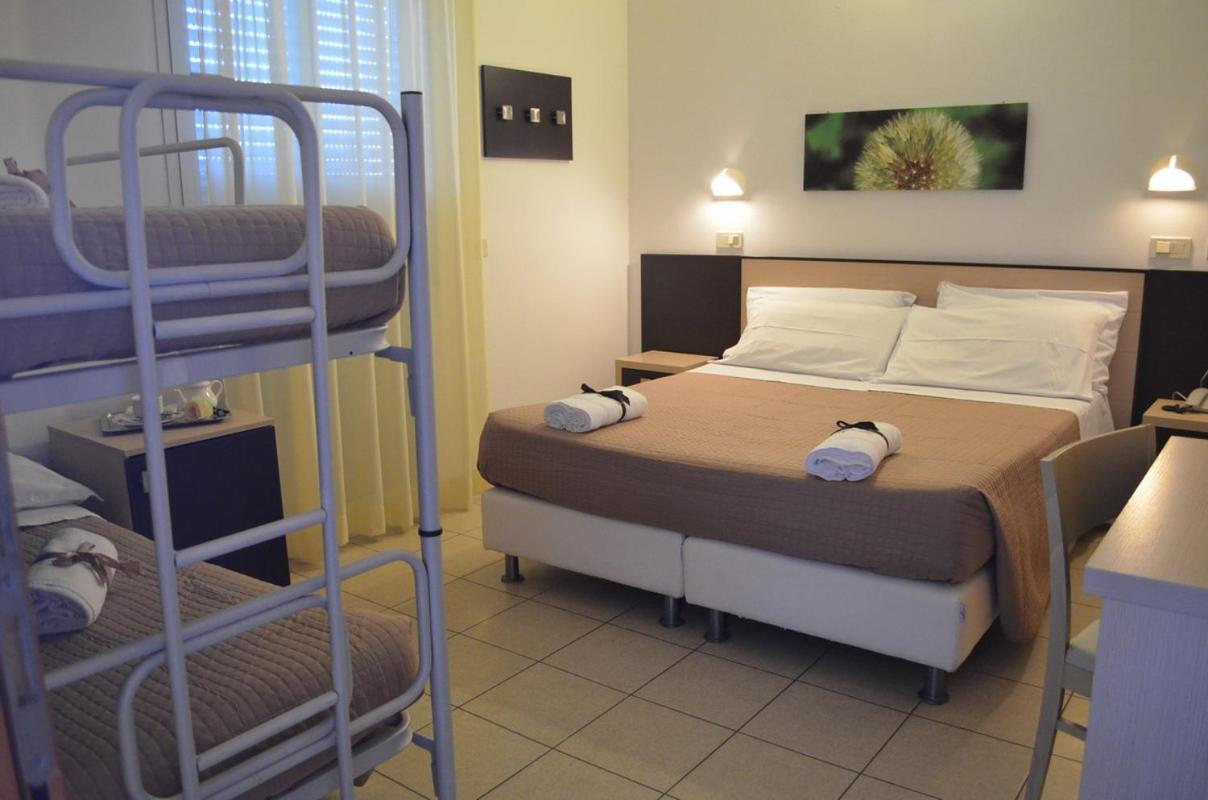 Quadruple Room - Photo 1