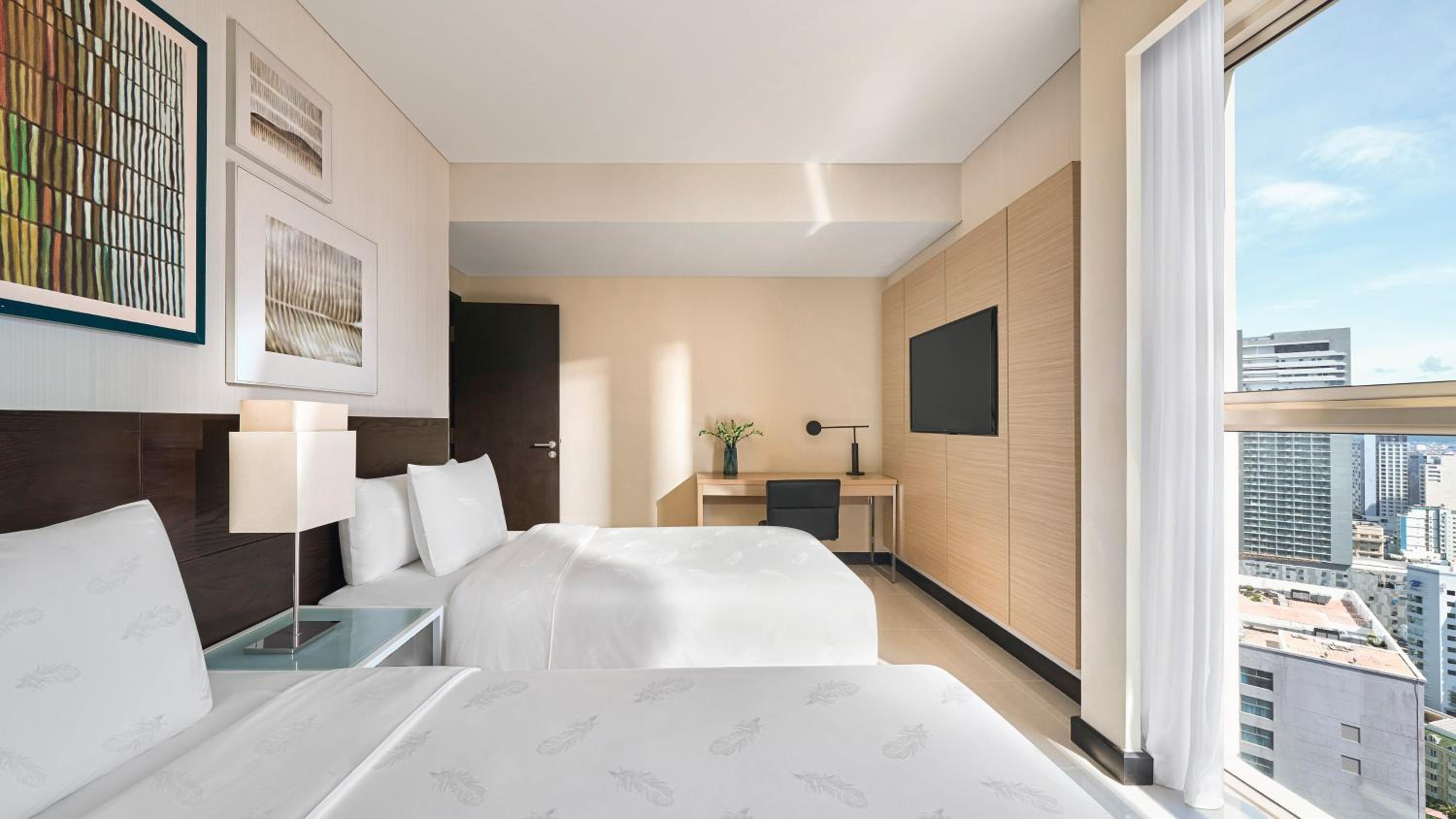 Two-Bedroom Suite with One King Bed, Two Single Beds and Ocean View