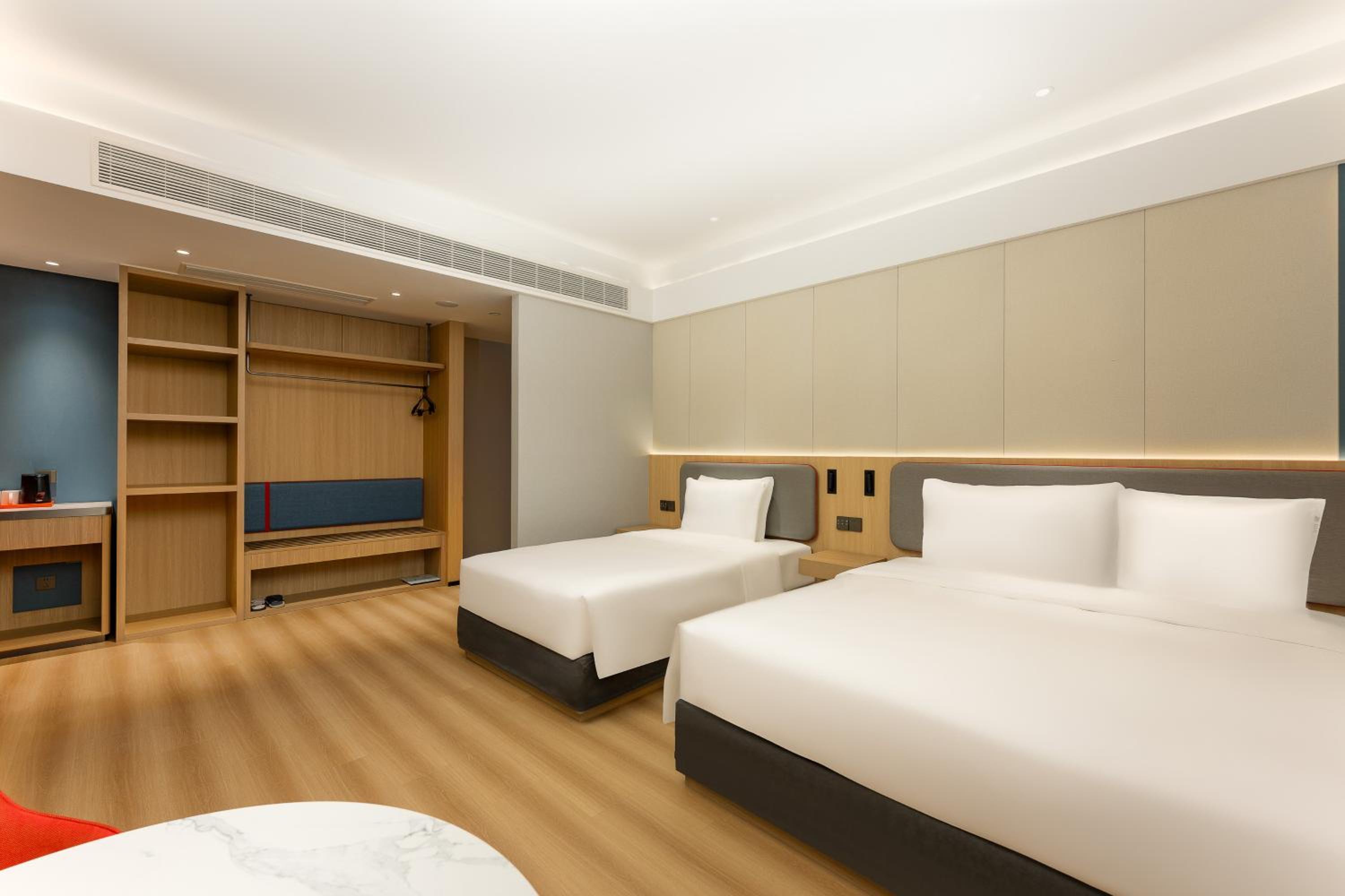 Standard Room with One Double and One King Bed