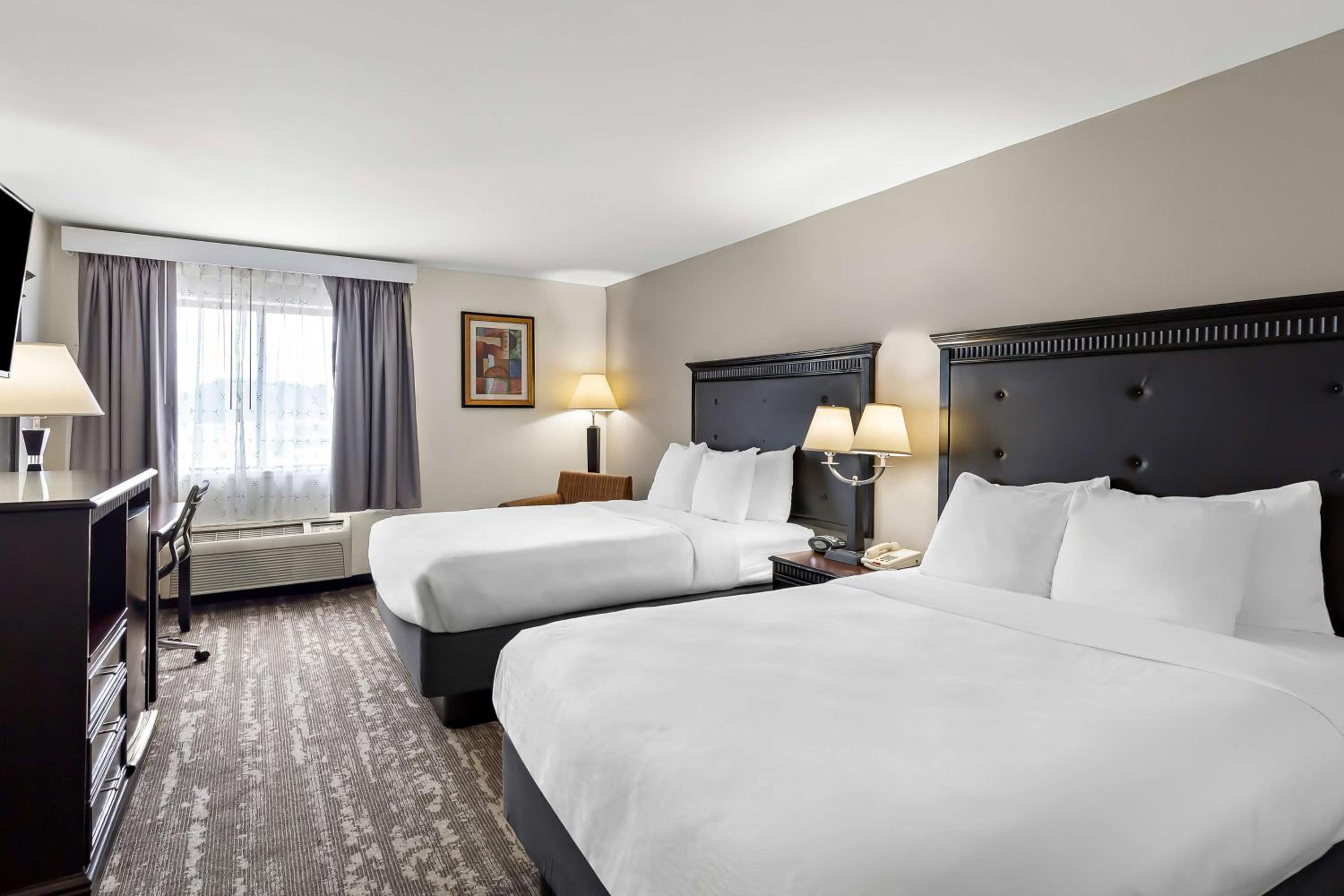 Queen Room with Two Queen Beds - Pet Friendly/Non-Smoking - Photo 1