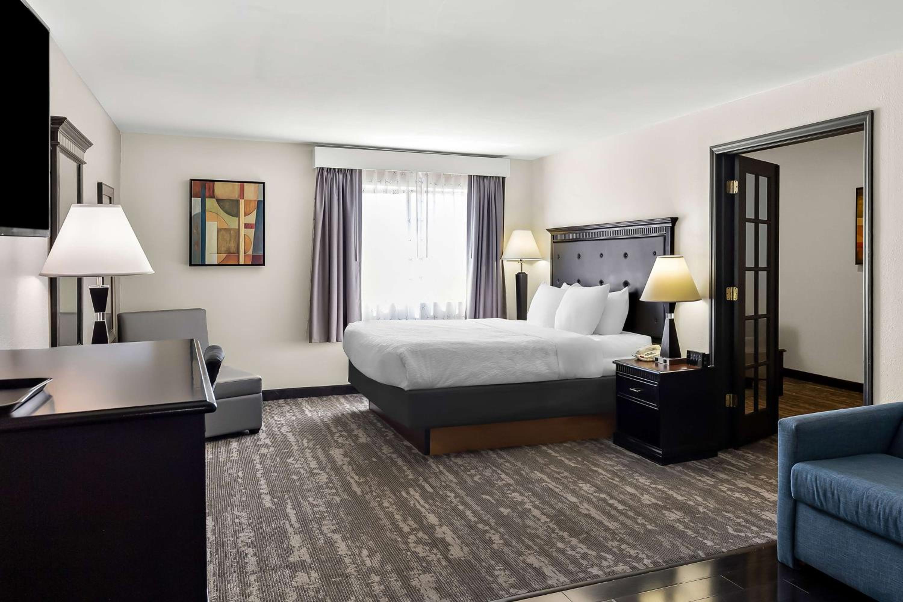 Two-Room King Suite with Sofa Bed - Pet Friendly/Non-Smoking - Photo 1