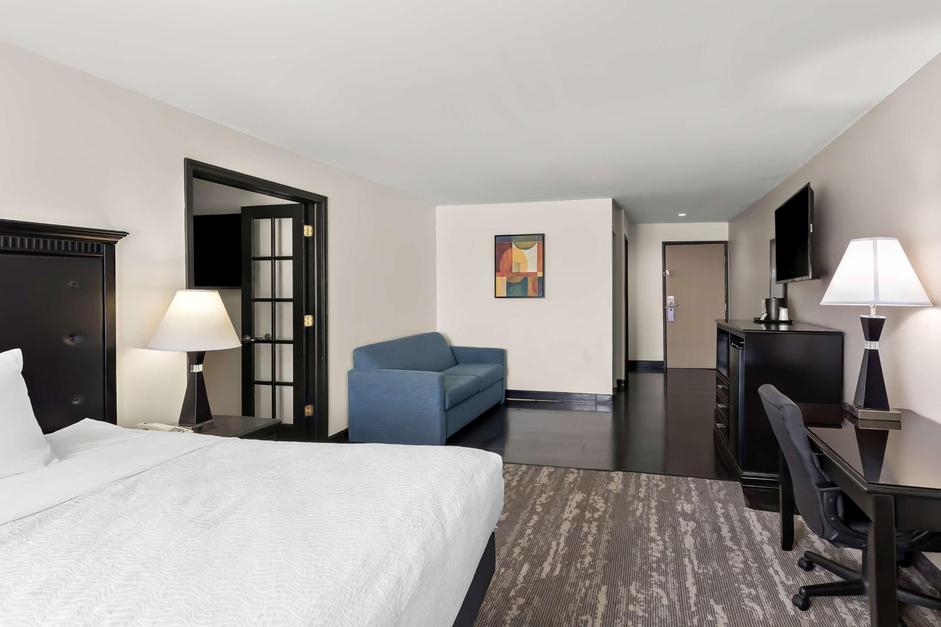 Two-Room King Suite with Sofa Bed - Pet Friendly/Non-Smoking - Photo 2