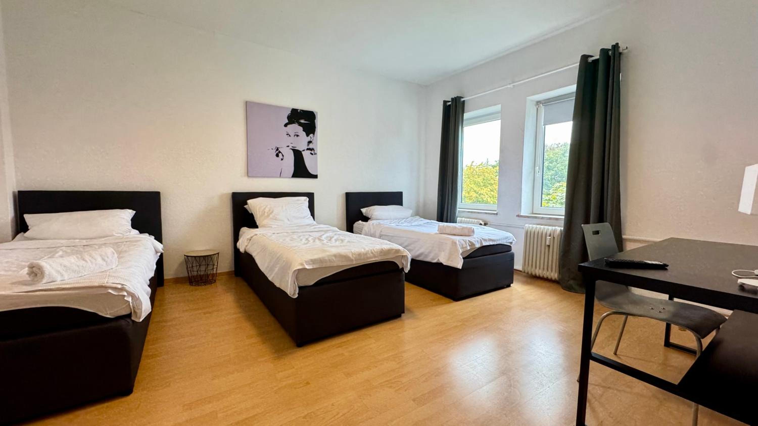Three-Bedroom Apartment photo 1