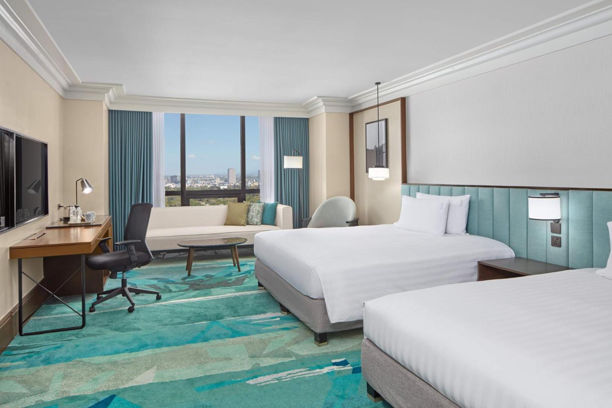 Premium Room with Two King Beds - Photo 2