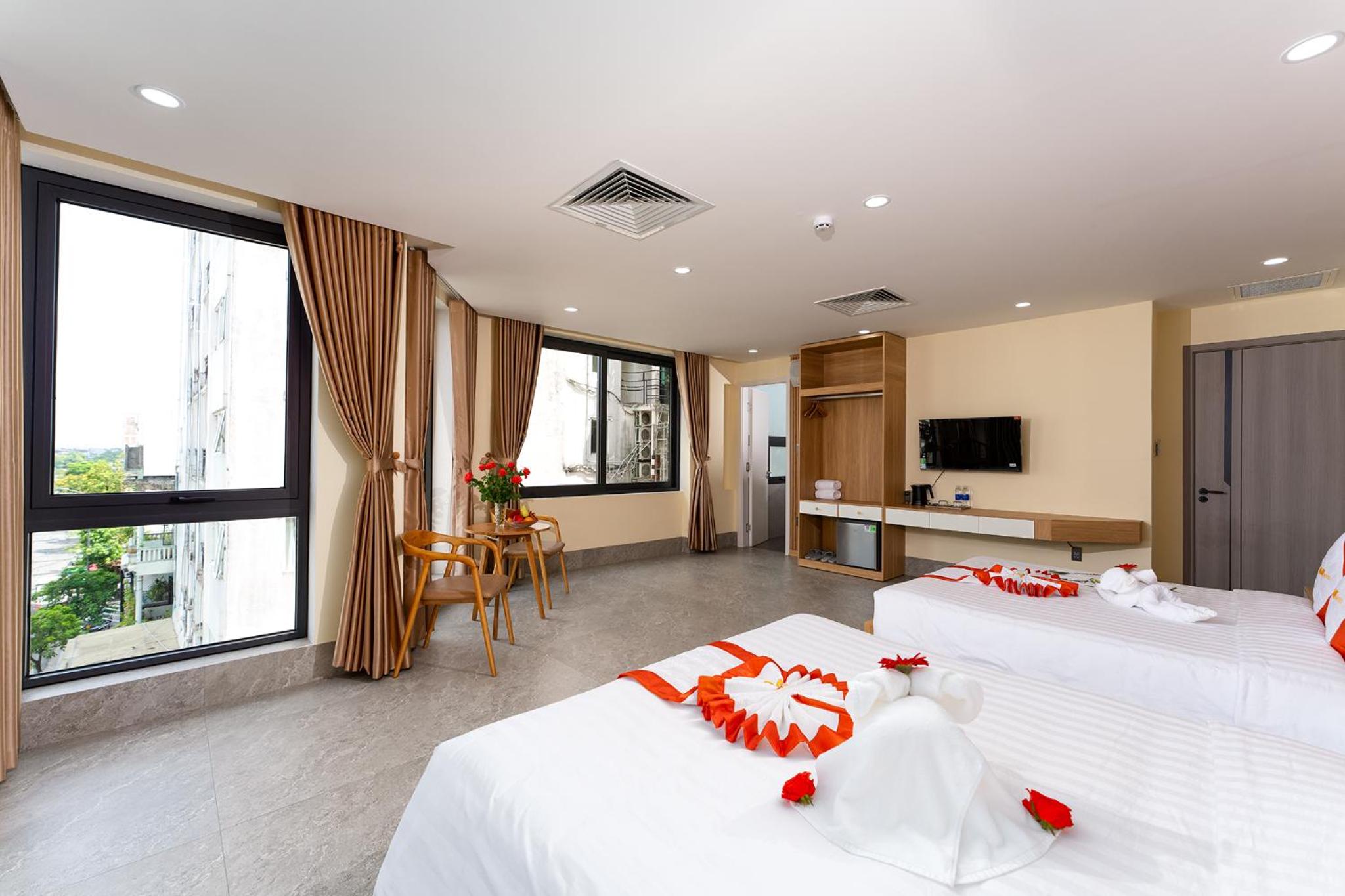 Deluxe Triple Room - Photo 12